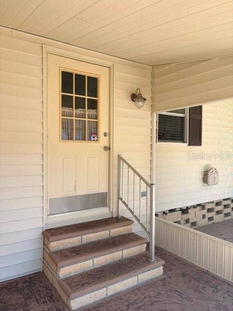 102 NATURE'S TRAIL, #79, Safety Harbor, FL 34695 Screened Patio Entry