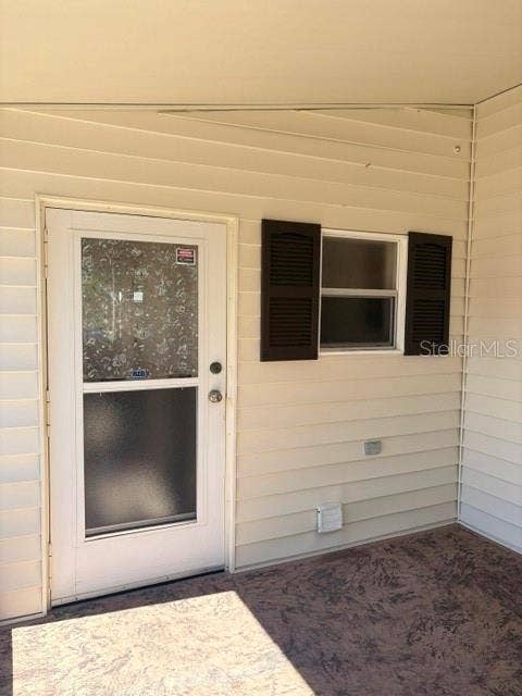 102 NATURE'S TRAIL, #79, Safety Harbor, FL 34695 Entrance to Utility Room with Laundry and Bonus Space