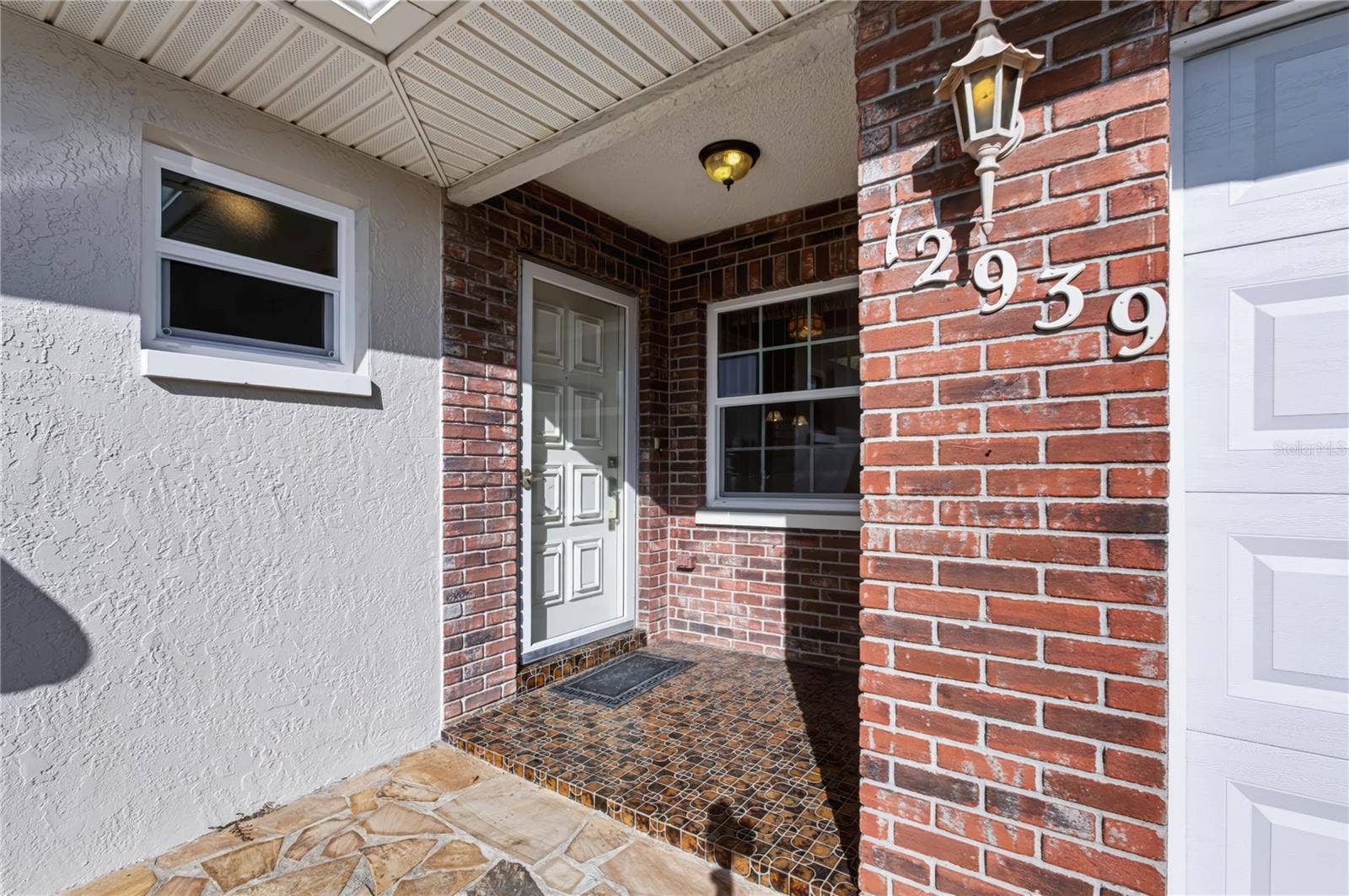12939 115TH STREET, Largo, FL 33778 Outside front entrance