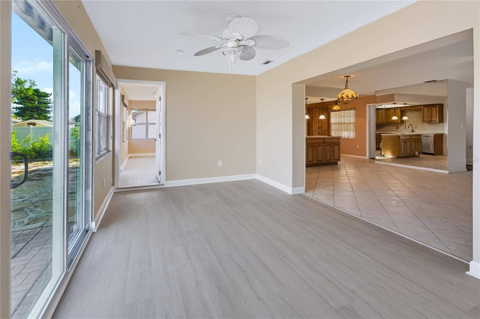 12939 115TH STREET, Largo, FL 33778 Exit the Florida room to the outdoor patio