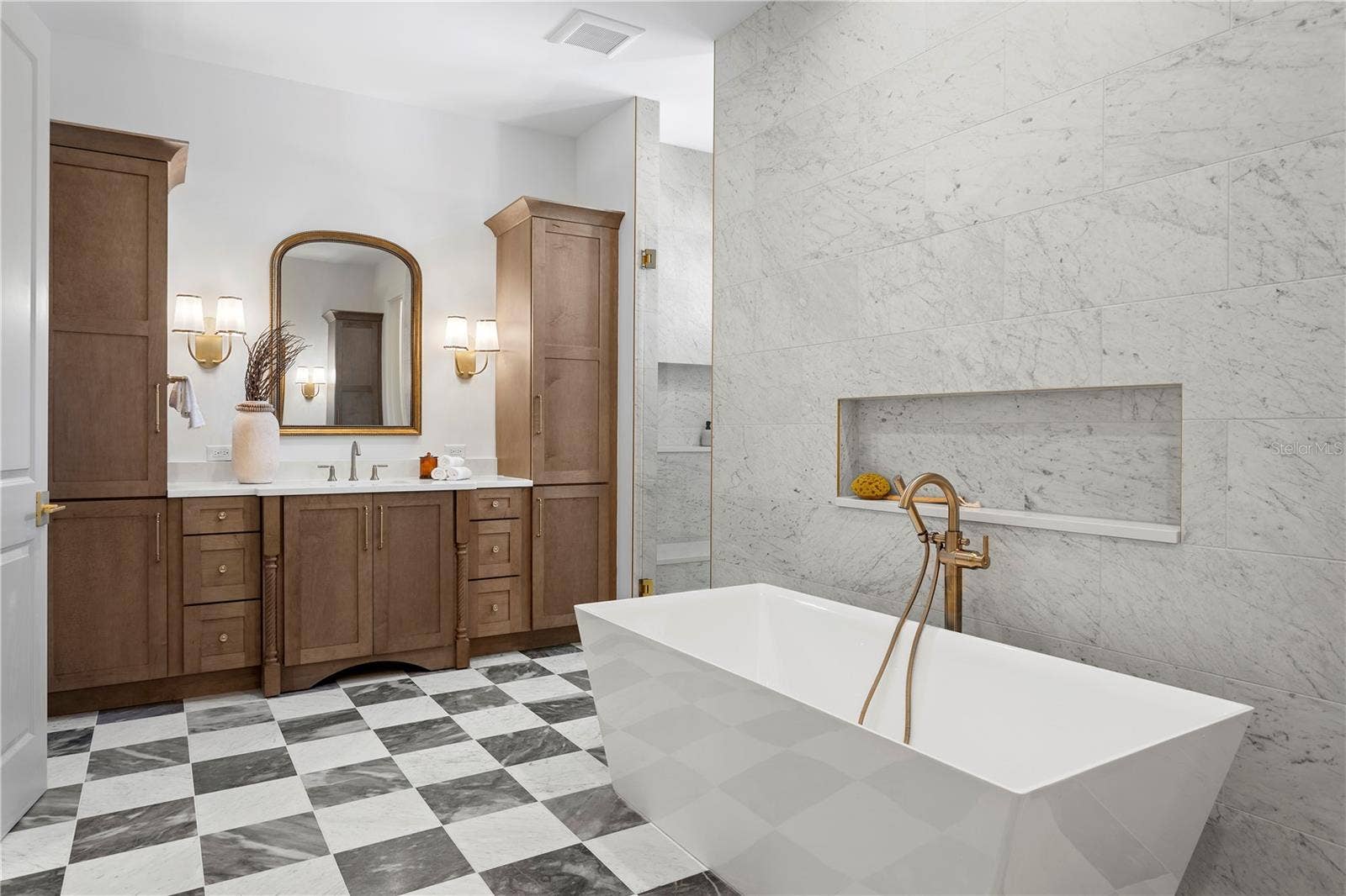 5008 W DICKENS AVENUE, Tampa, FL 33629 Primary bath with marble floors, soaking tub and large walk in shower