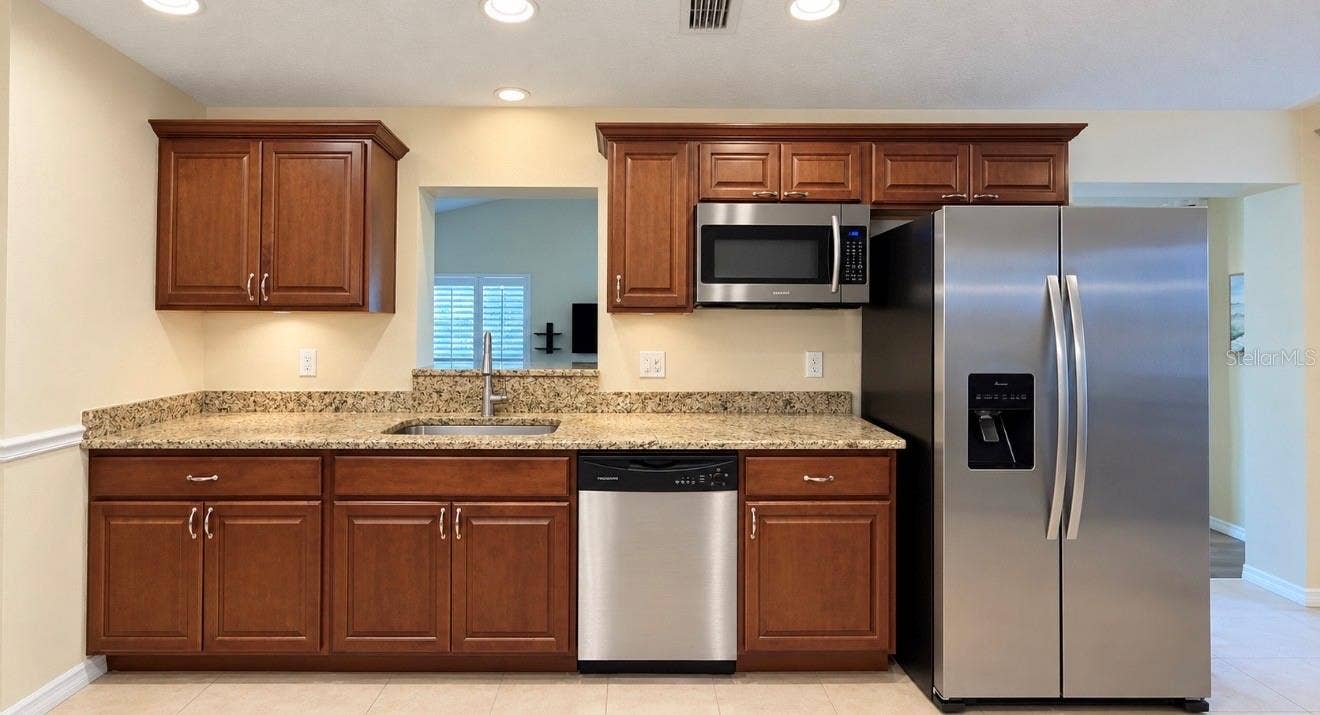 1231 ROSEWOOD STREET, Largo, FL 33770 kitchen with stainless steel appliances