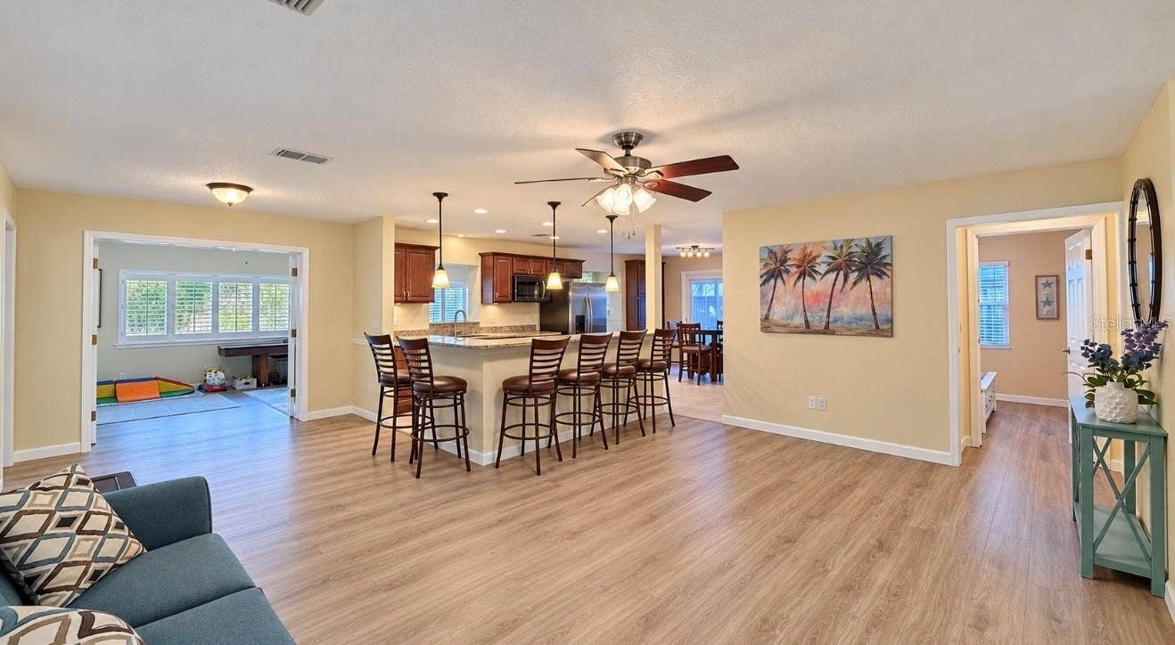 1231 ROSEWOOD STREET, Largo, FL 33770 Living room to kitchen