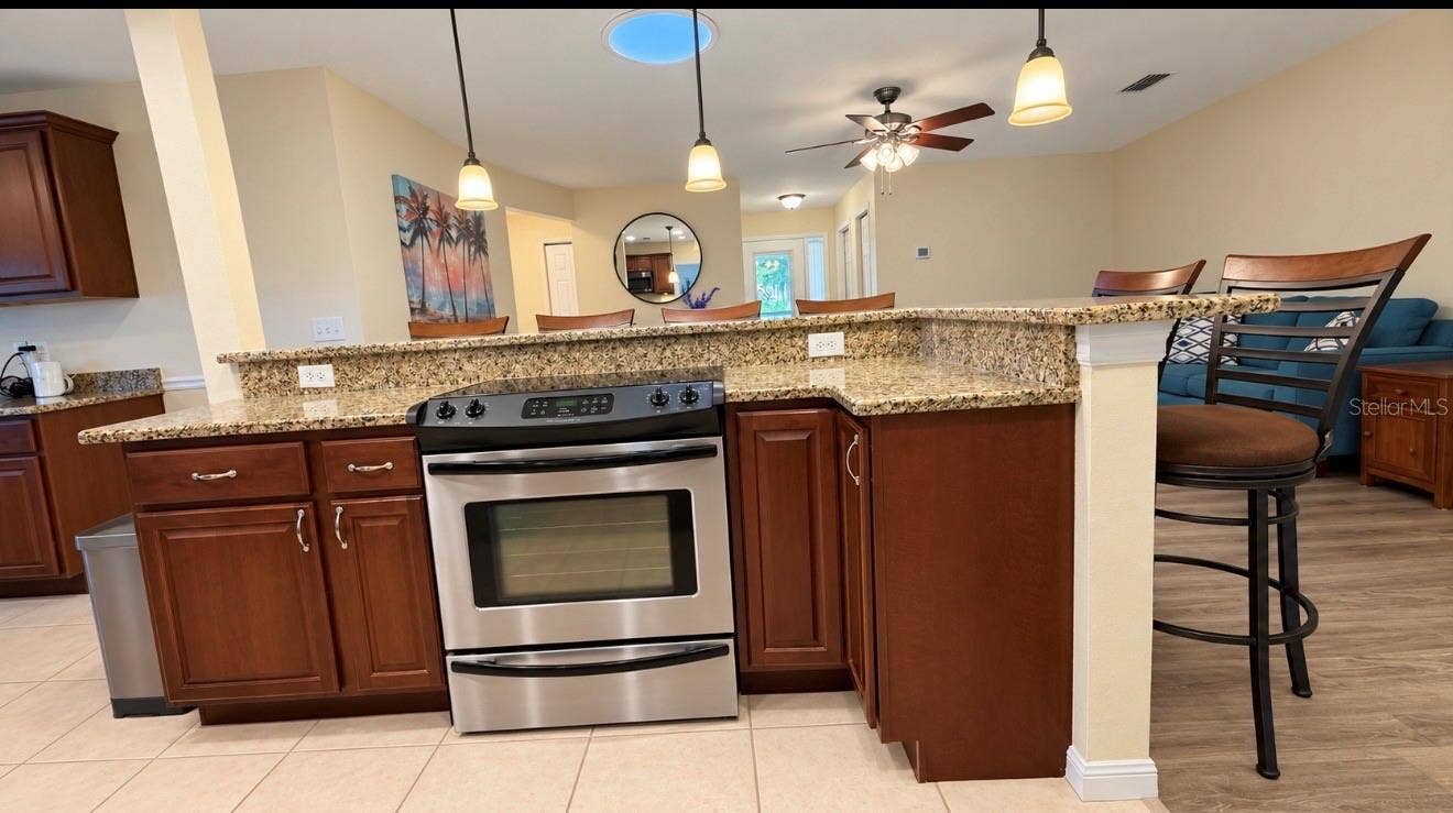 1231 ROSEWOOD STREET, Largo, FL 33770 kitchen island with range