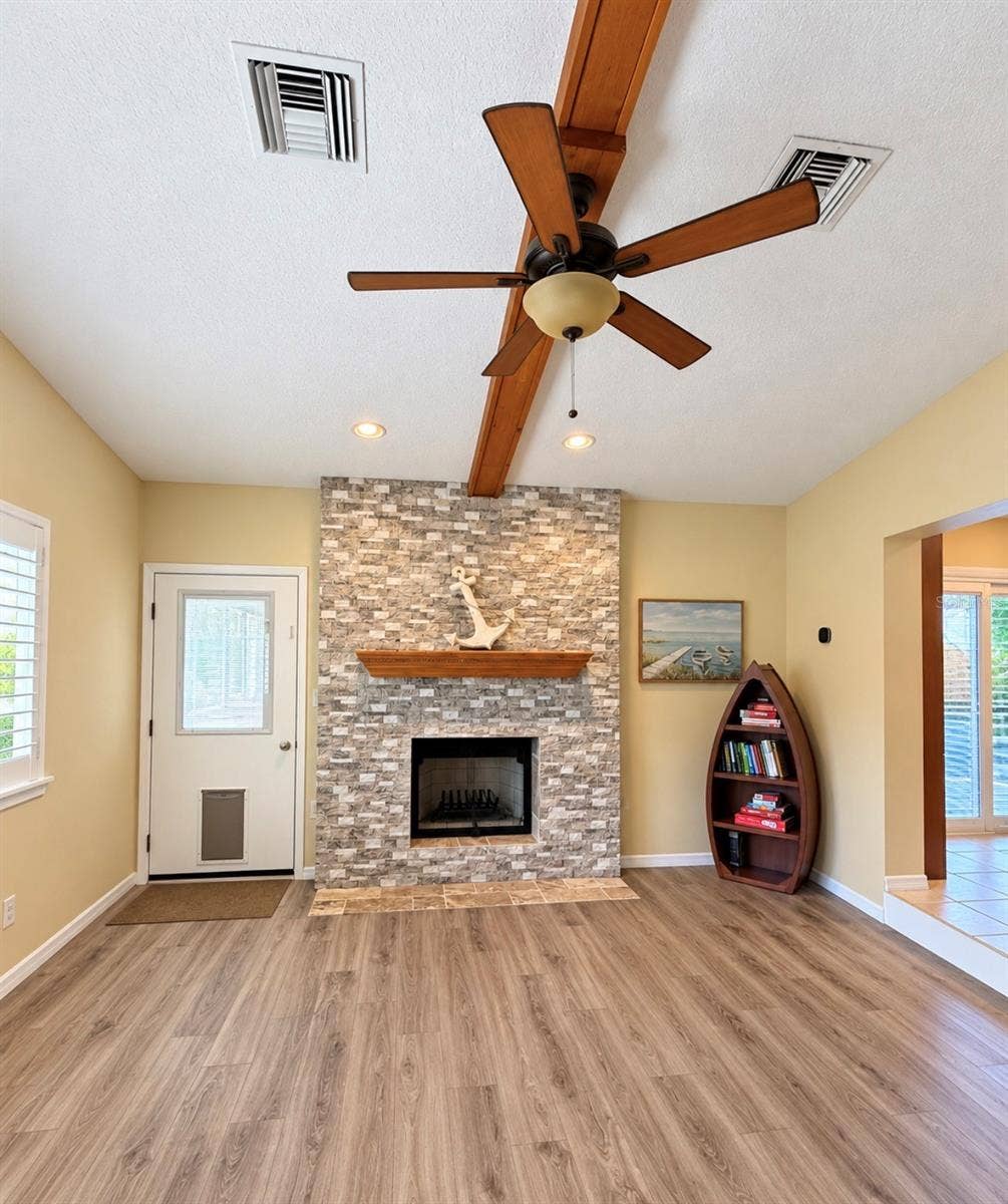 1231 ROSEWOOD STREET, Largo, FL 33770 Family room with fireplace