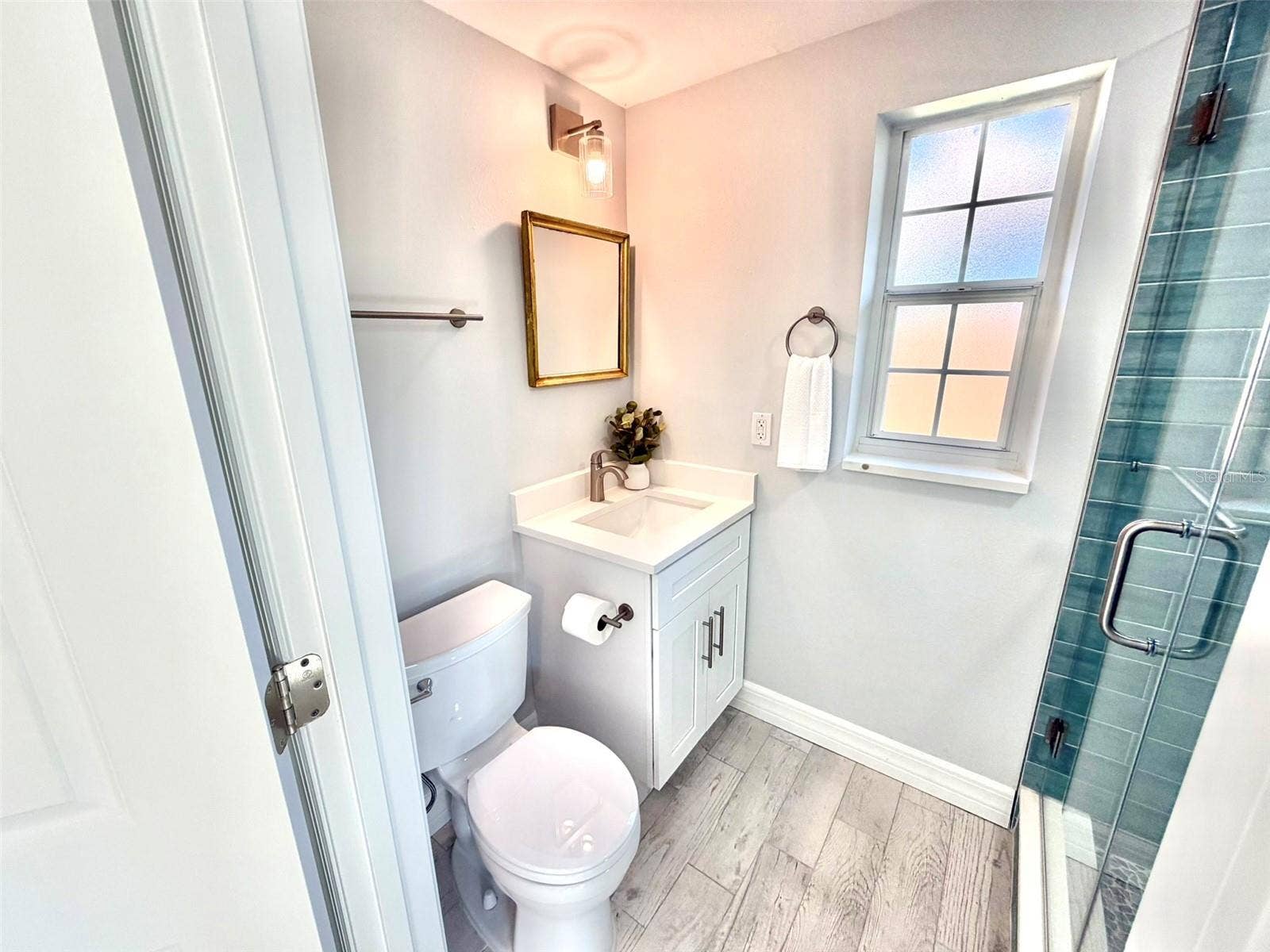 336 SHADDOCK STREET, Tarpon Springs, FL 34689 Ensuite to Bedroom 2