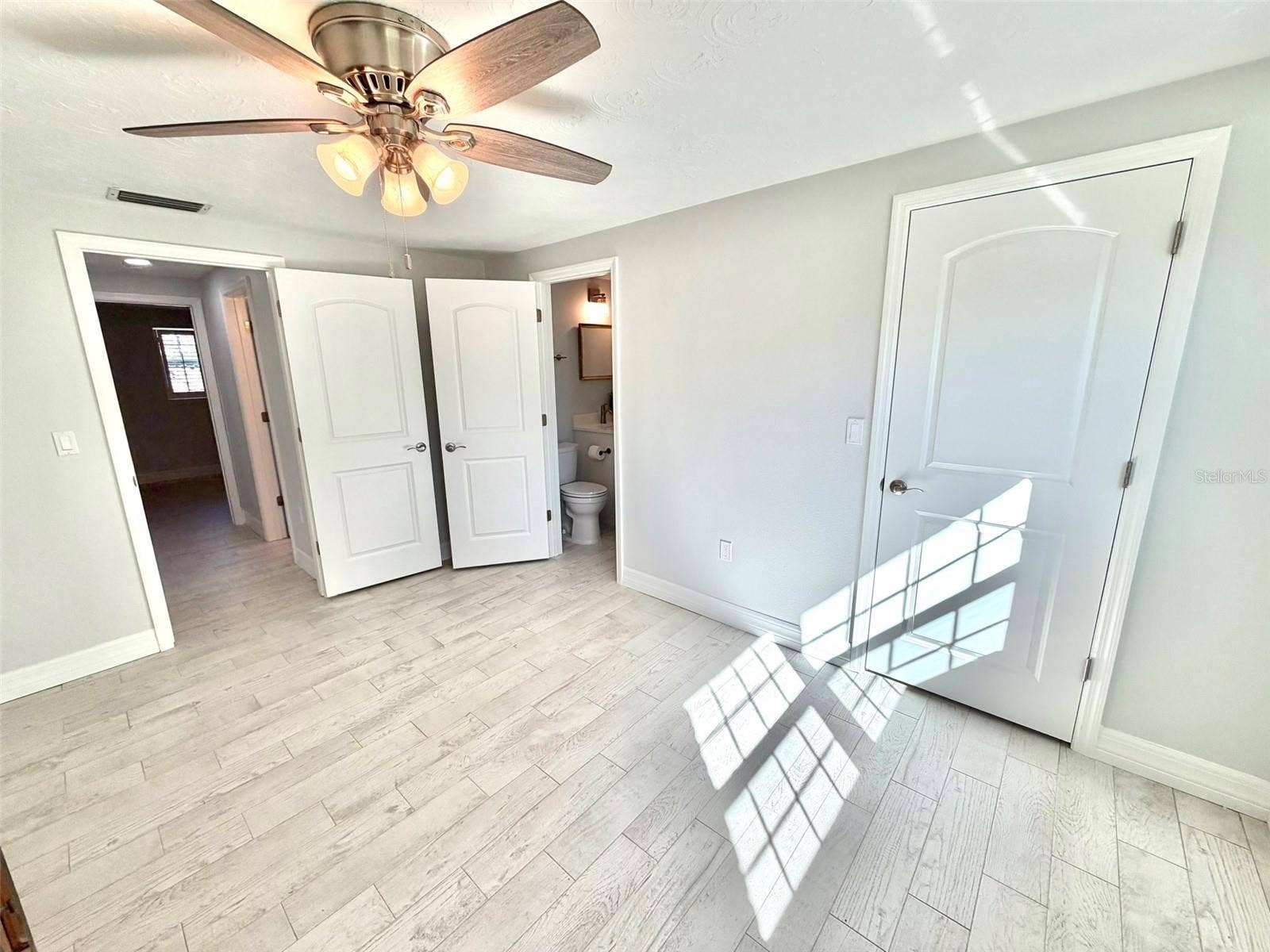 336 SHADDOCK STREET, Tarpon Springs, FL 34689 Second Bedroom has Ensuite Bath and Walk in Closet