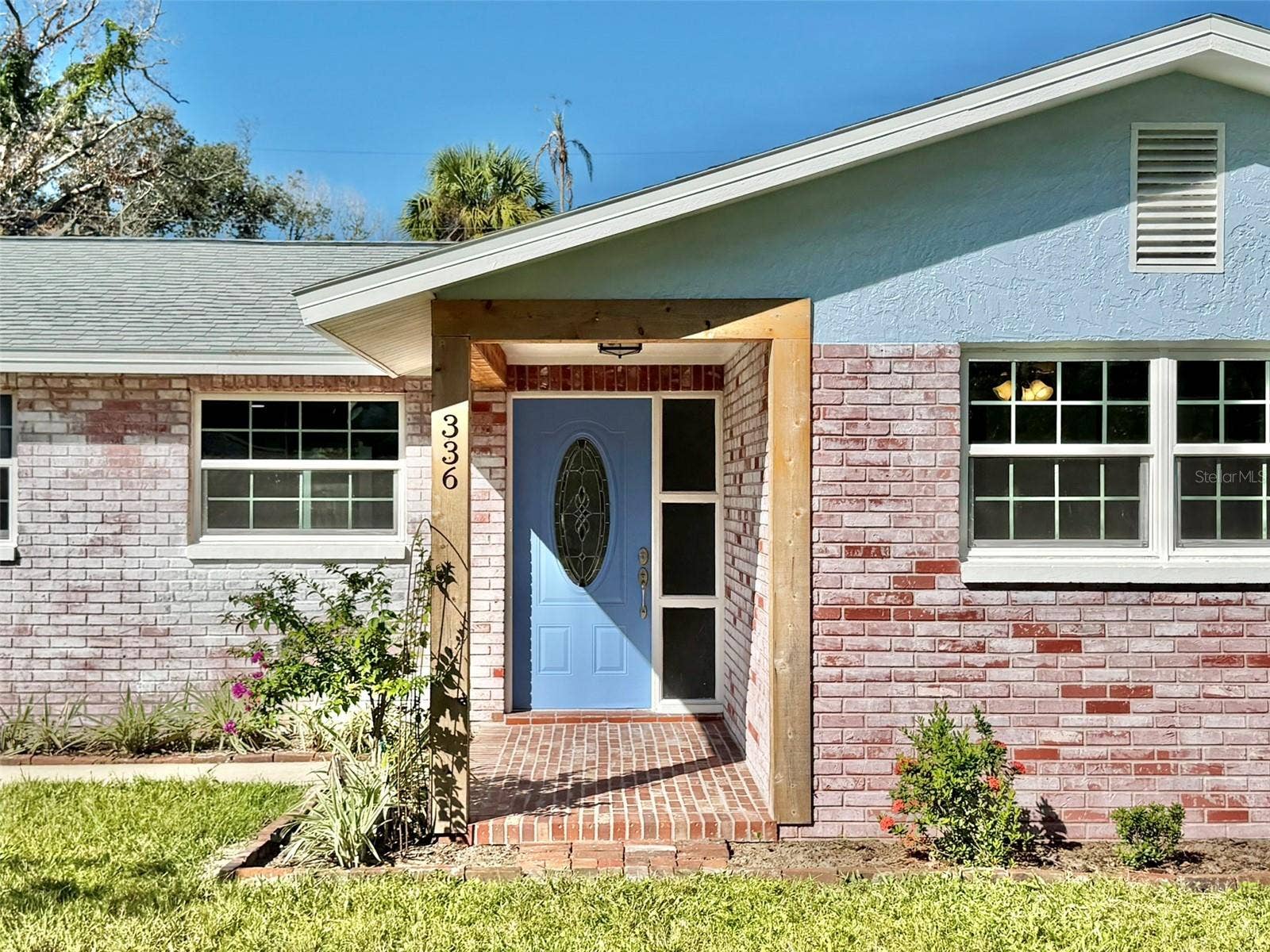 336 SHADDOCK STREET, Tarpon Springs, FL 34689 Warm Cedar Accents Surround the Covered Front Porch