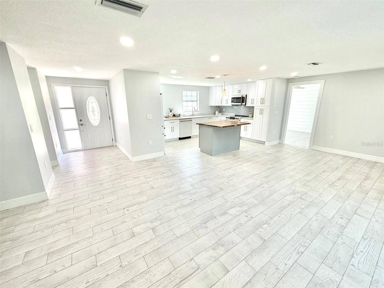 336 SHADDOCK STREET, Tarpon Springs, FL 34689 The front foyer leads to the Beautiful Open Living Space