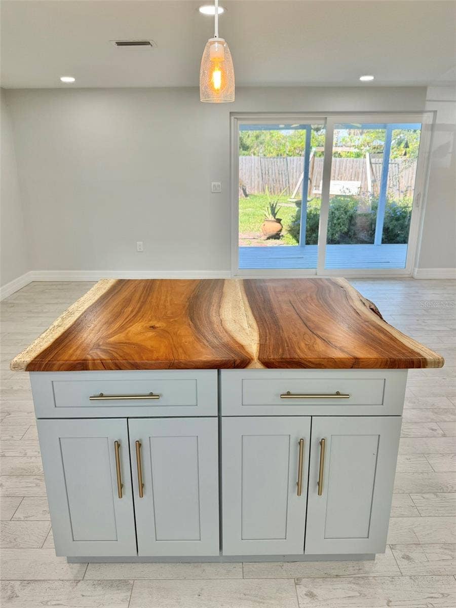 336 SHADDOCK STREET, Tarpon Springs, FL 34689 Custom Island with Locally made Live Edge Countertop