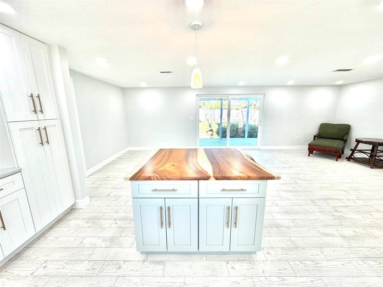 336 SHADDOCK STREET, Tarpon Springs, FL 34689 Pantry Cabinets and additional storage in the Island