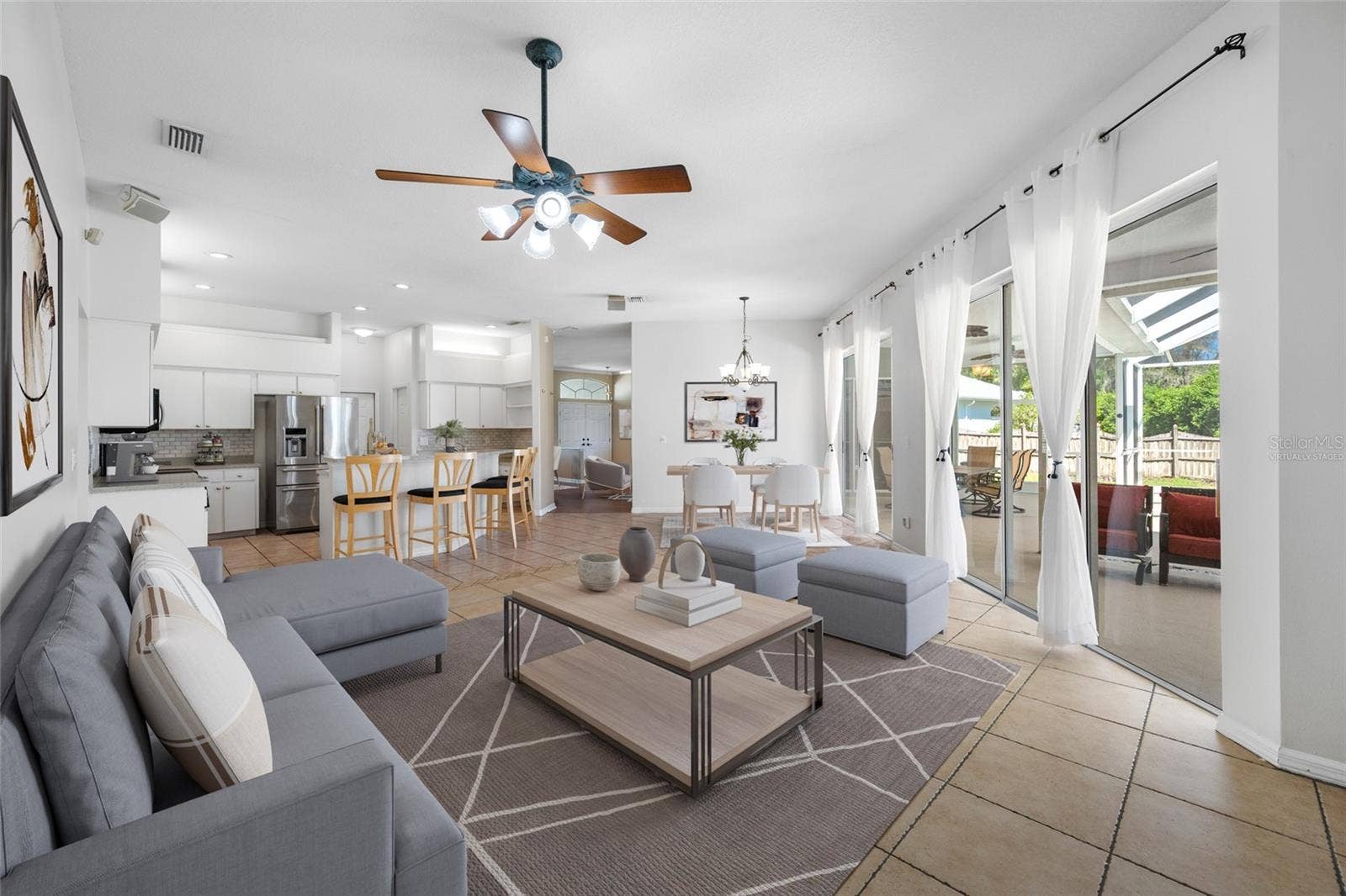 1648 WOODRIDGE COURT, Lutz, FL 33559 Family Room - VIRTUALLY STAGED