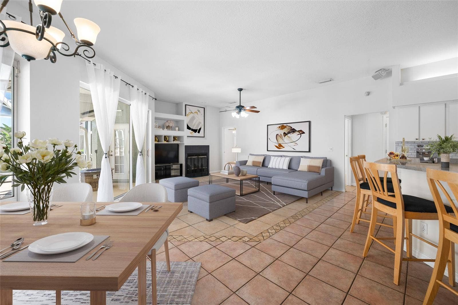 1648 WOODRIDGE COURT, Lutz, FL 33559 Family Room & Dining Area - VIRTUALLY STAGED