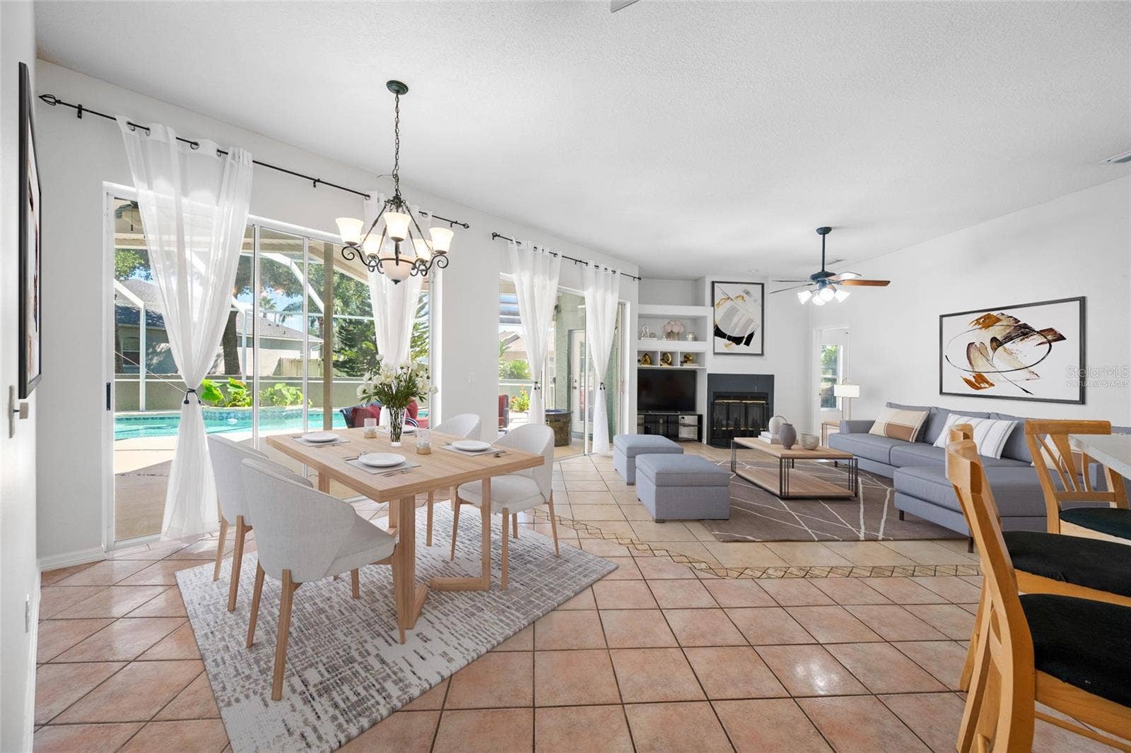 1648 WOODRIDGE COURT, Lutz, FL 33559 Family Room & Dining Area - VIRTUALLY STAGED