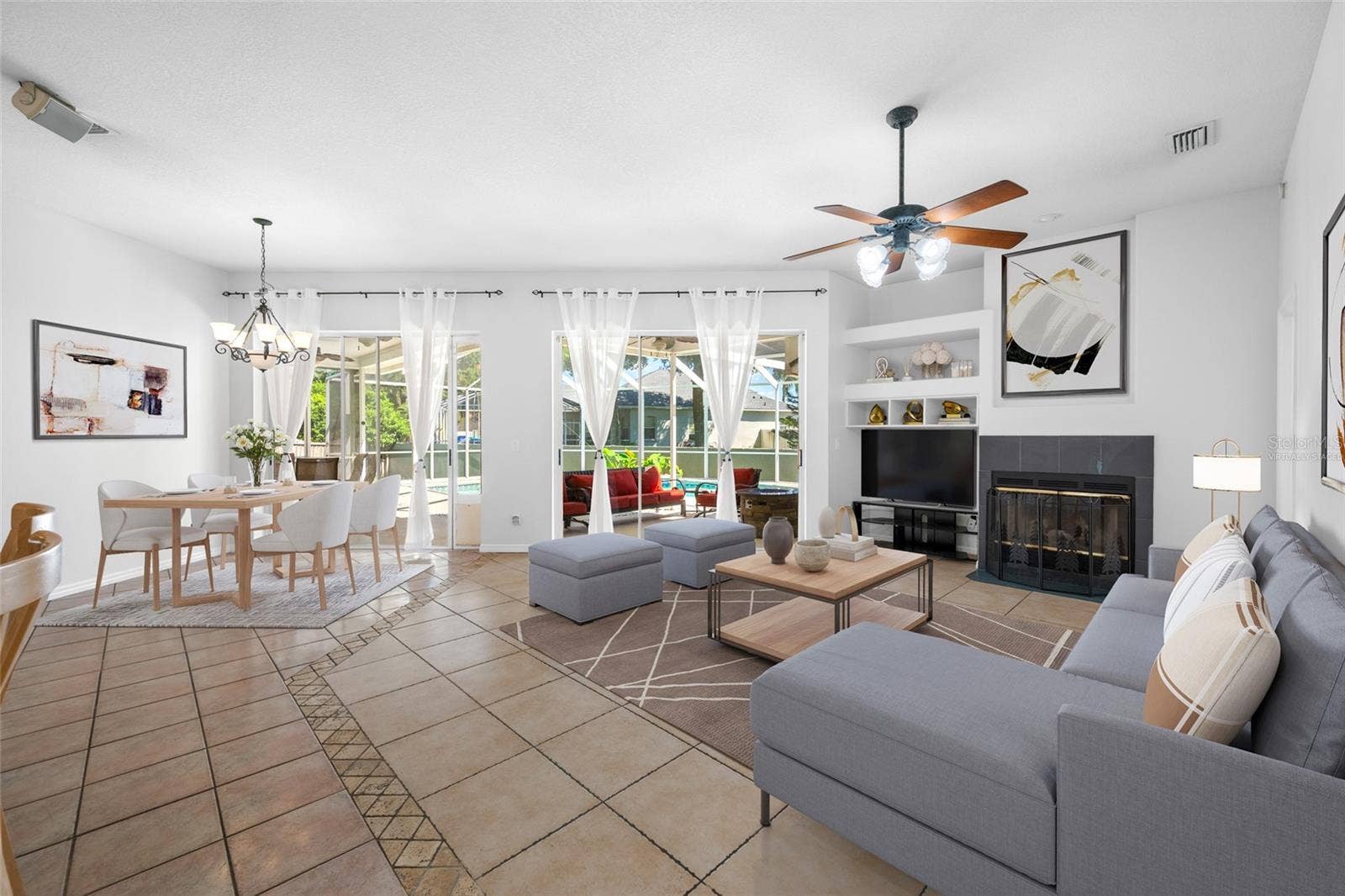 1648 WOODRIDGE COURT, Lutz, FL 33559 Family Room & Dining Area - VIRTUALLY STAGED