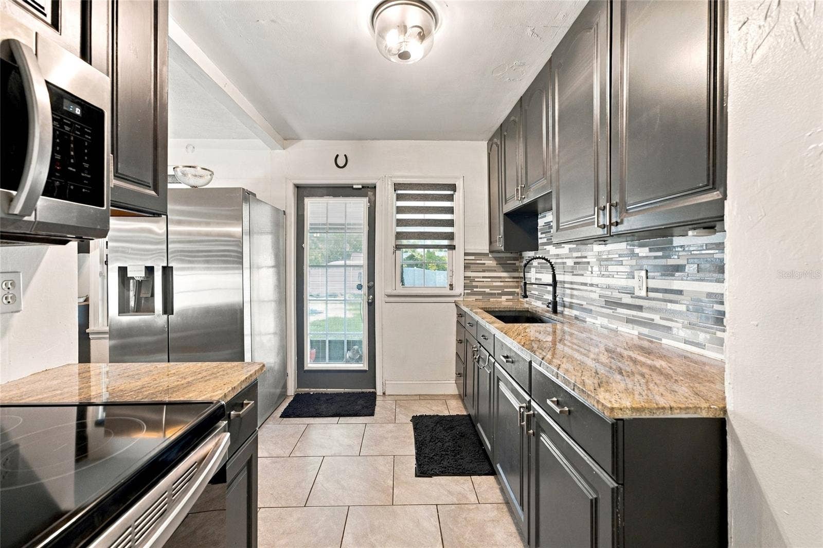 1427 E COMANCHE AVENUE, Tampa, FL 33604 1427 E COMANCHE AVENUE, Tampa, FL 33604