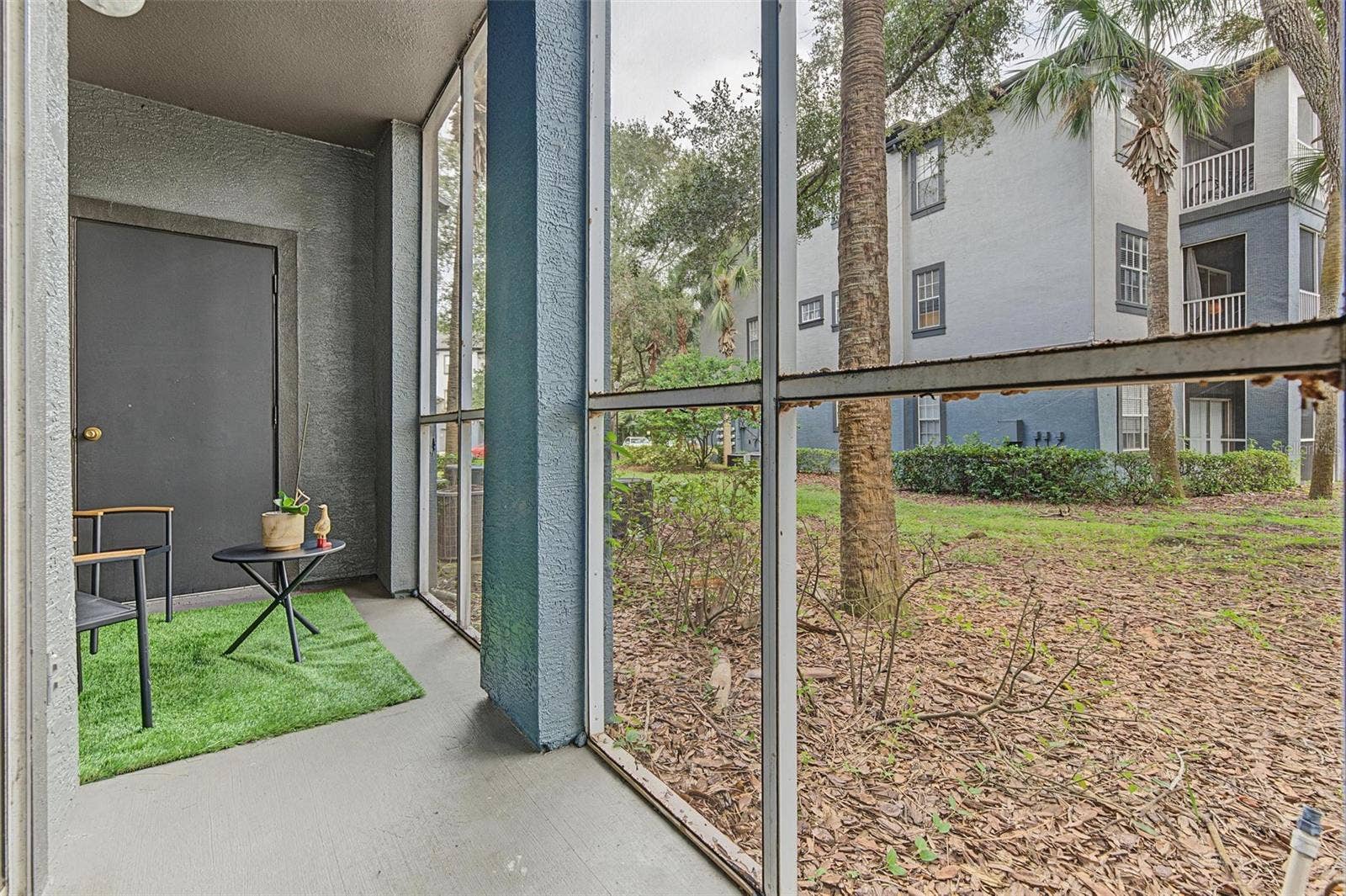 13123 SANCTUARY COVE DRIVE, #104, Temple Terrace, FL 33637 Screened In Back Patio - 13123 Sanctuary Cove Drive - Unit 104