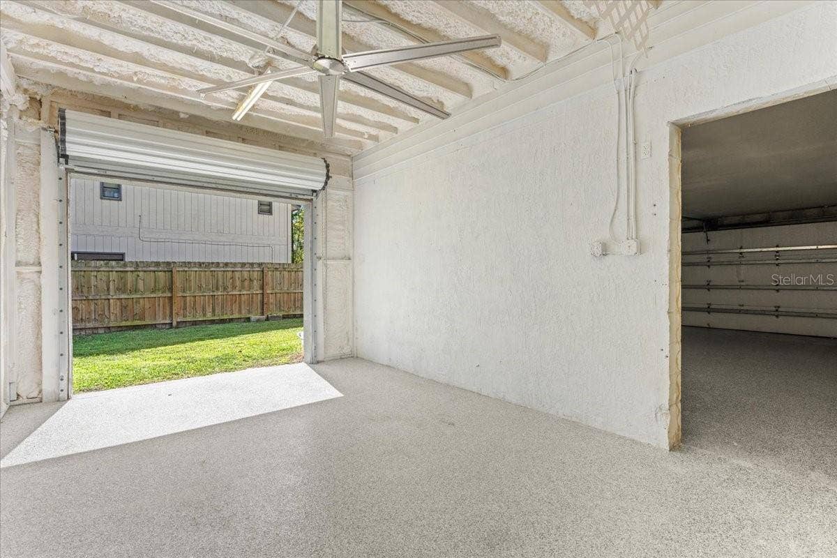 Third Garage w/ Roll Up Door
