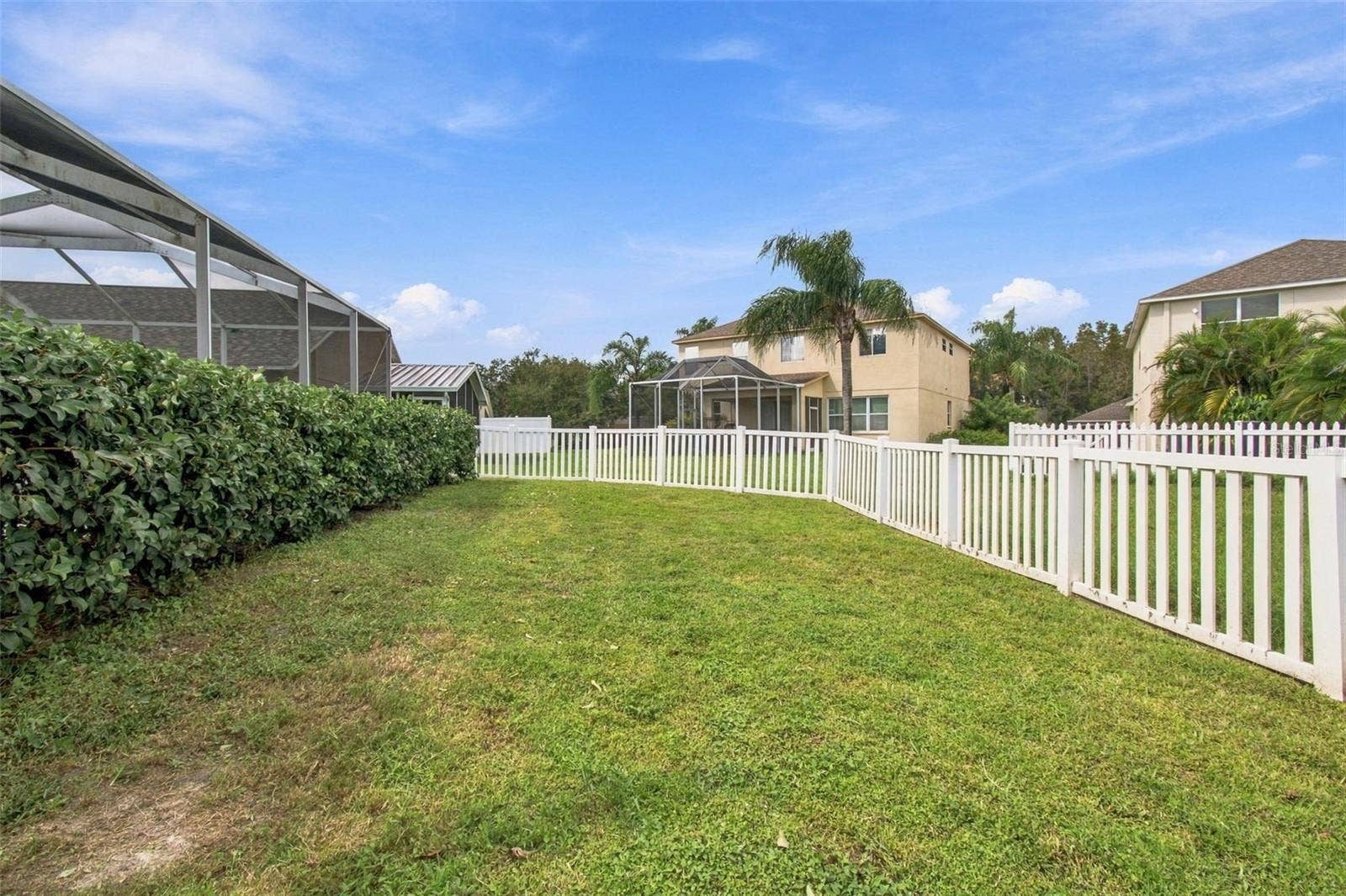 Your home also features a large fenced in backyard with privacy landscape while overlooking a serene pond.