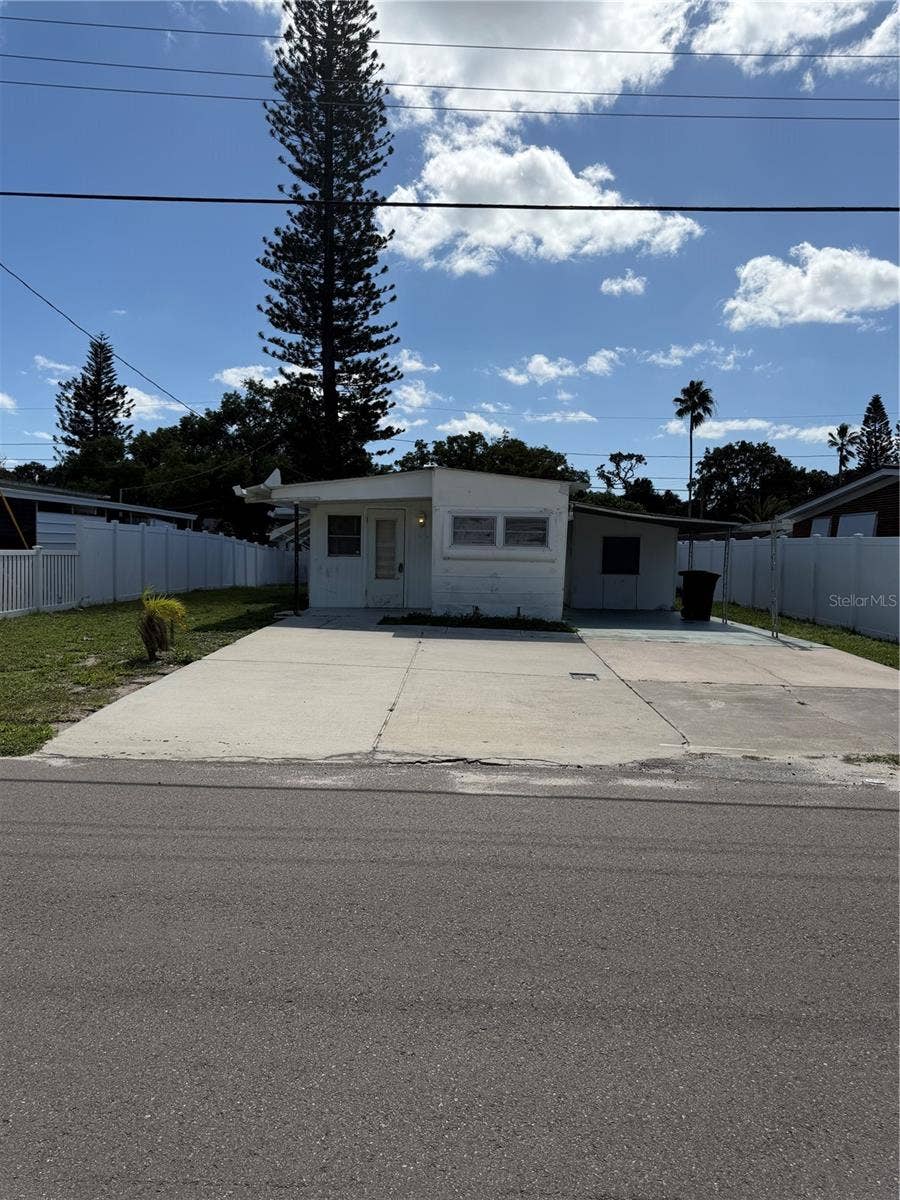 4120 BUENA VISTA LANE, Holiday, FL 34691 Parking pad and front of mobile home