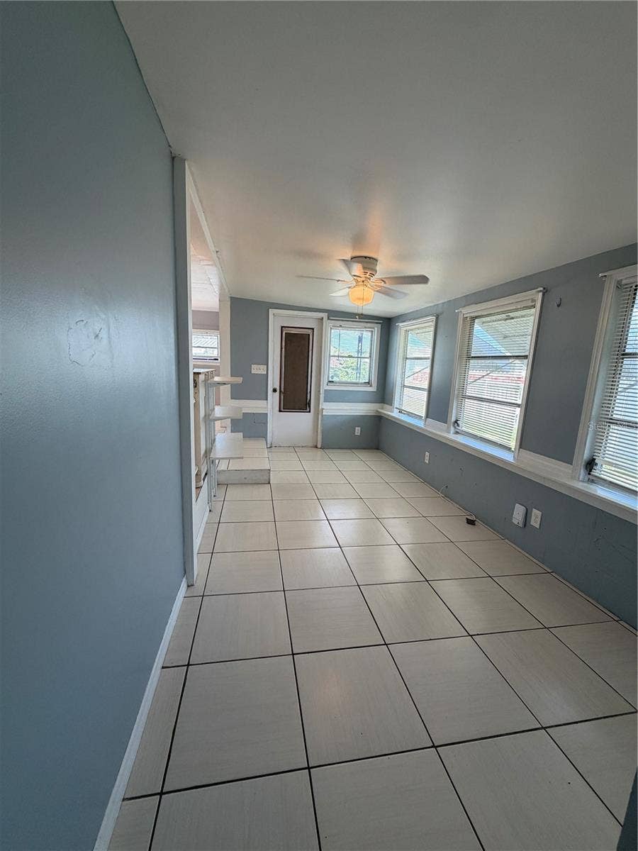 4120 BUENA VISTA LANE, Holiday, FL 34691 View of the main living area and front door.