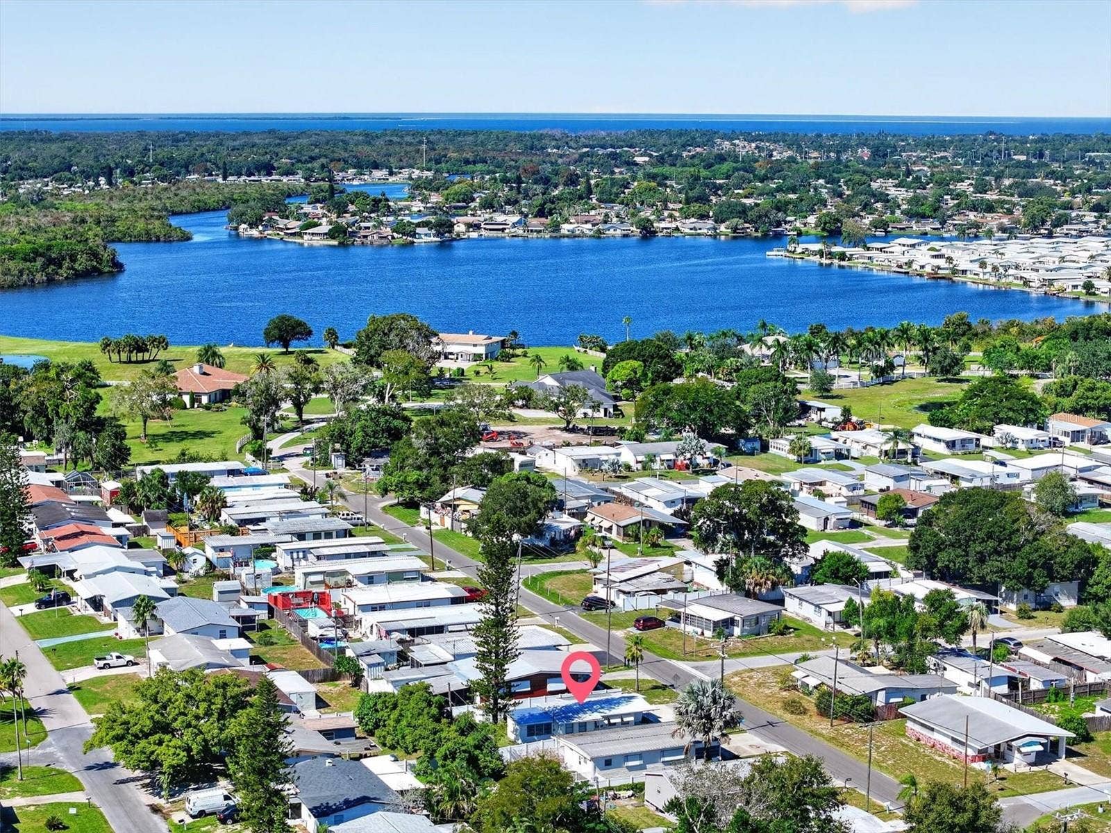 4120 BUENA VISTA LANE, Holiday, FL 34691 Red arrow shows location of mobile home. Not in a flood zone.