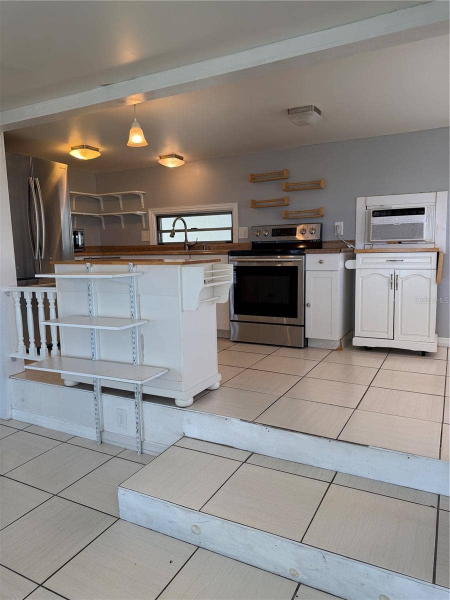 4120 BUENA VISTA LANE, Holiday, FL 34691 Another view of the kitchen