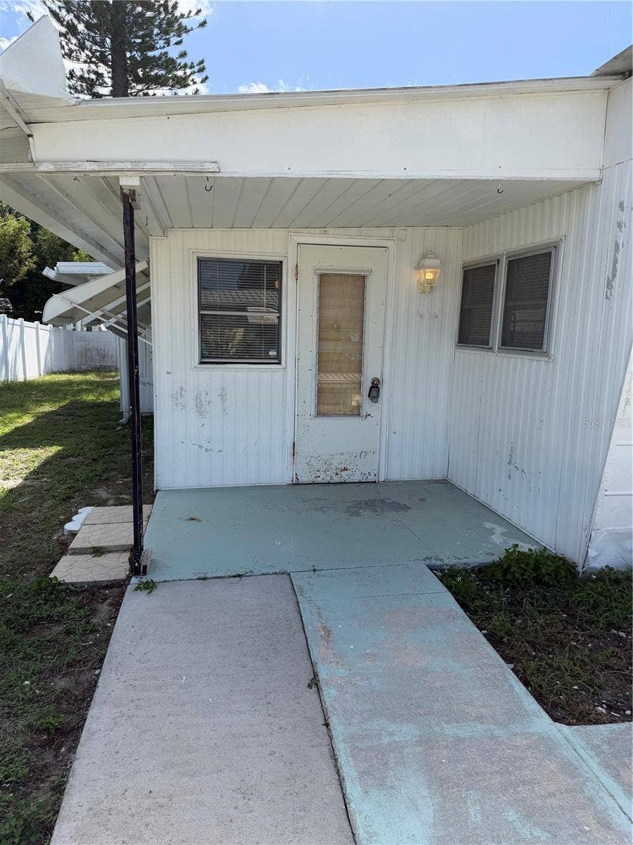 4120 BUENA VISTA LANE, Holiday, FL 34691 Front door entrance