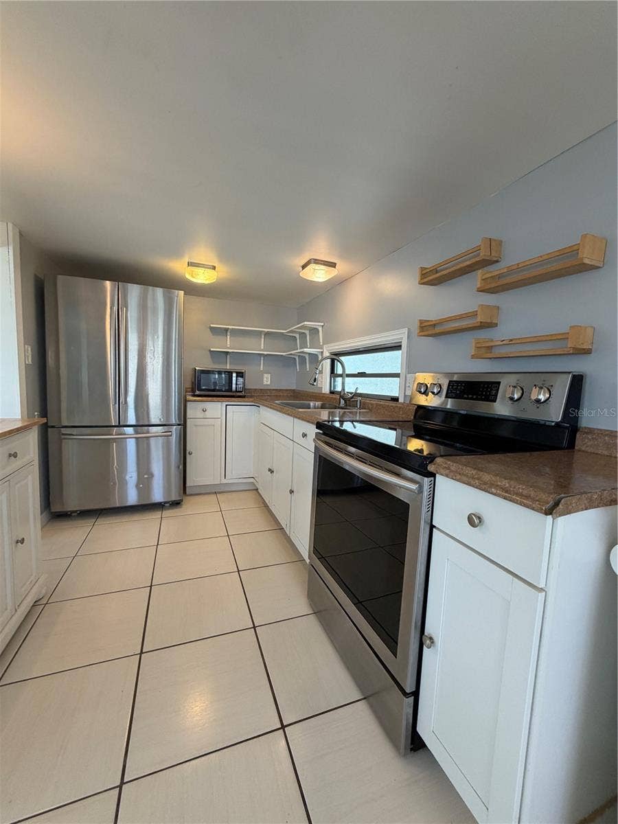 4120 BUENA VISTA LANE, Holiday, FL 34691 another view of the kitchen