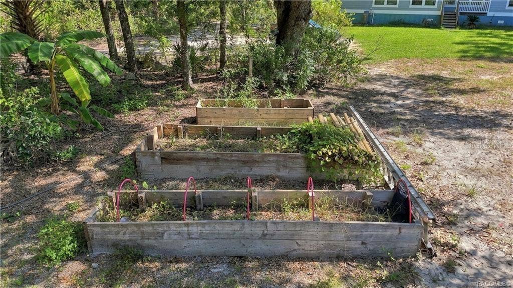 7528 N CHABAUD TERRACE, Crystal River, FL 34428 GROW SOMETHING WONDERFUL! Raised wooden garden beds provide a great opportunity to enjoy gardening, grow fresh vegetables, herbs or colorful flowers!