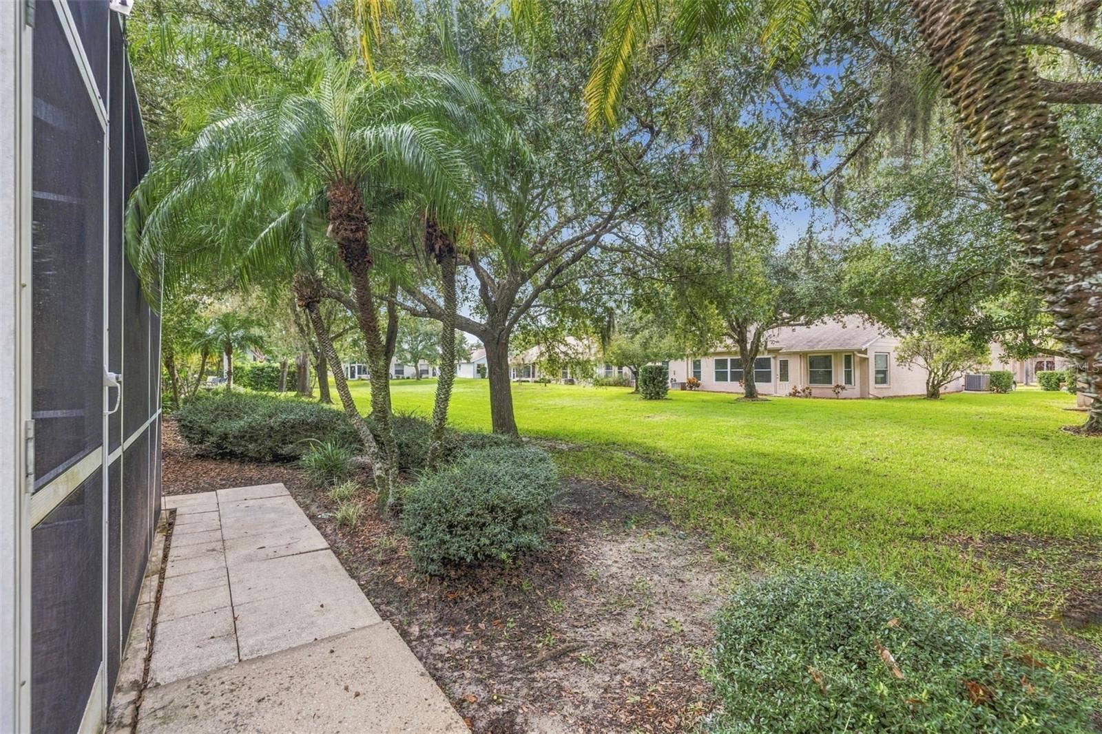 1149 WOLFORD DRIVE, New Port Richey, FL 34655 Wide space between the villas offering privacy