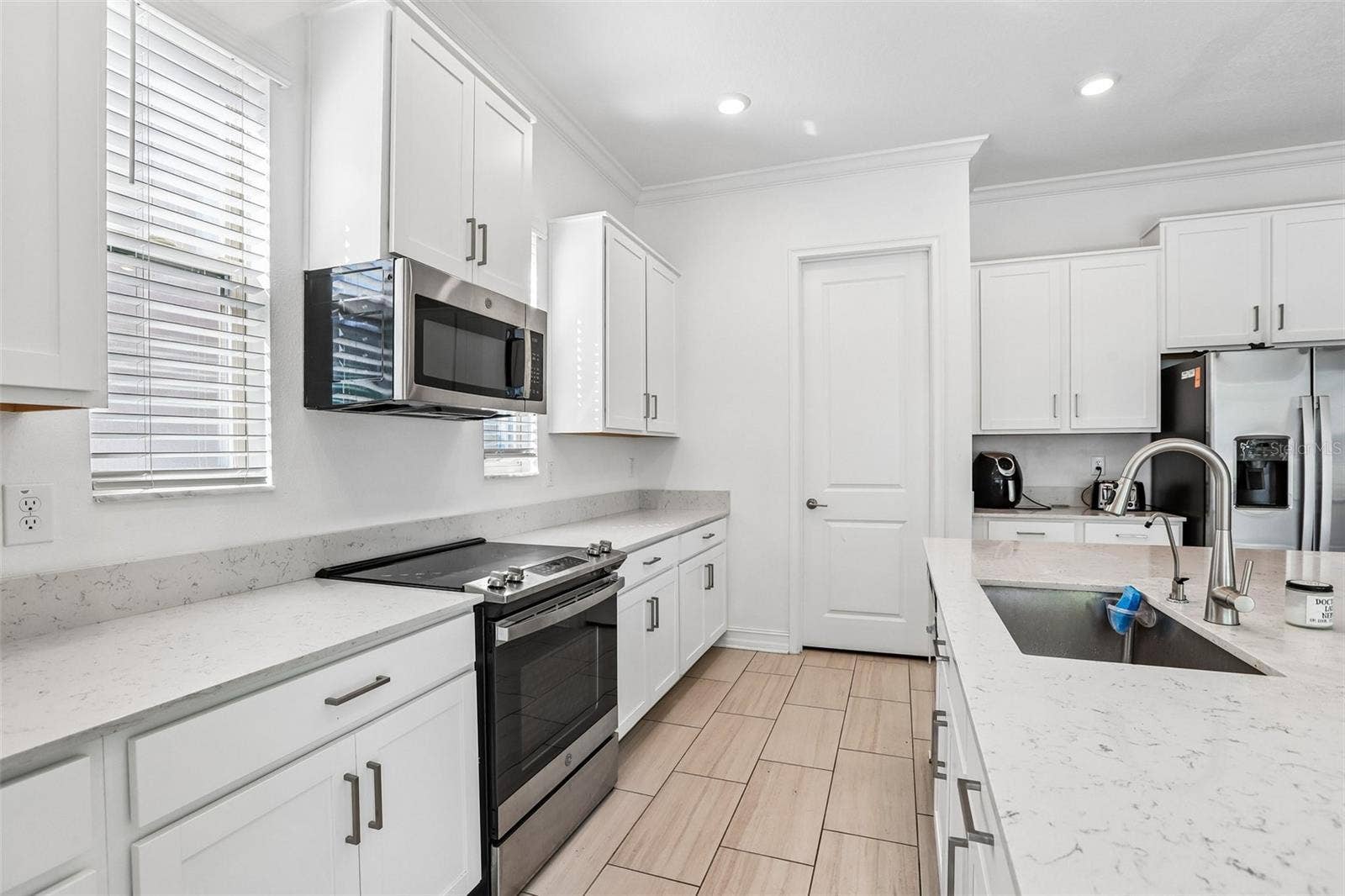 7702 S KISSIMMEE STREET, Tampa, FL 33616