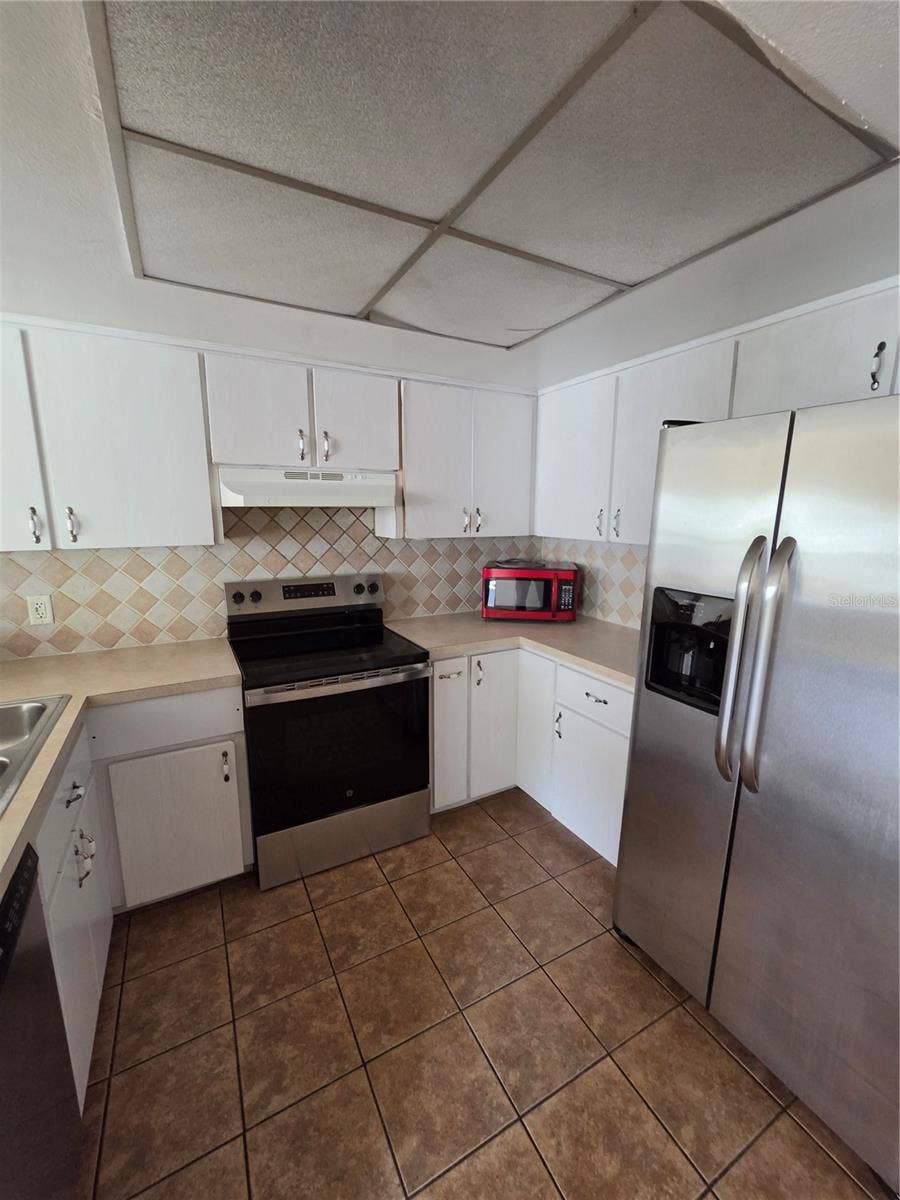 11630 BAYWOOD MEADOWS DRIVE, #4, New Port Richey, FL 34654 11630 BAYWOOD MEADOWS DRIVE, #4, New Port Richey, FL 34654