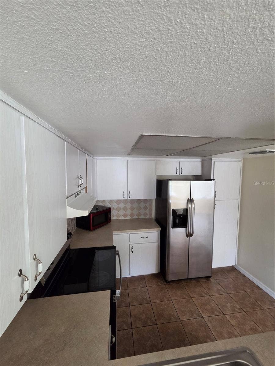 11630 BAYWOOD MEADOWS DRIVE, #4, New Port Richey, FL 34654 11630 BAYWOOD MEADOWS DRIVE, #4, New Port Richey, FL 34654