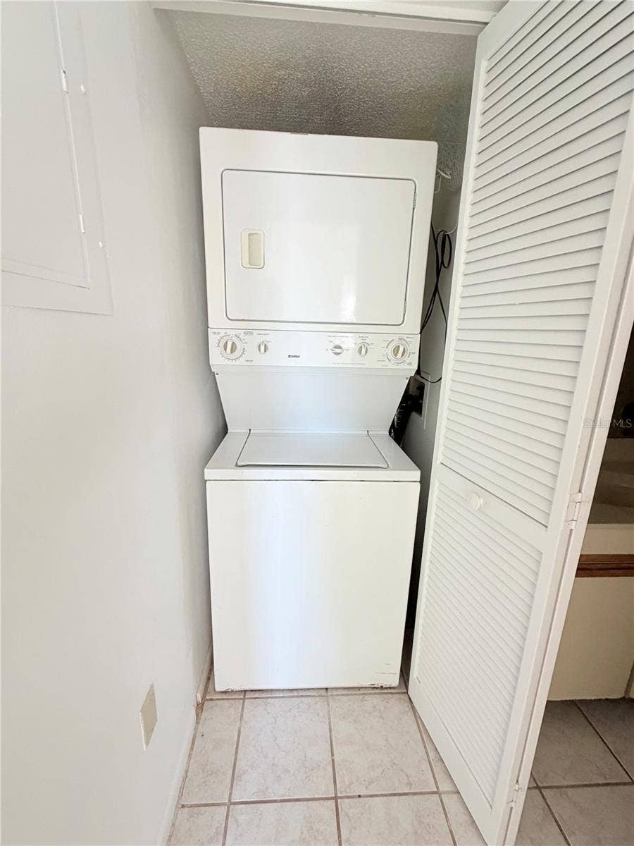 8151 HEATHERWOOD DRIVE, #111, Seminole, FL 33777 inside laundry closet
