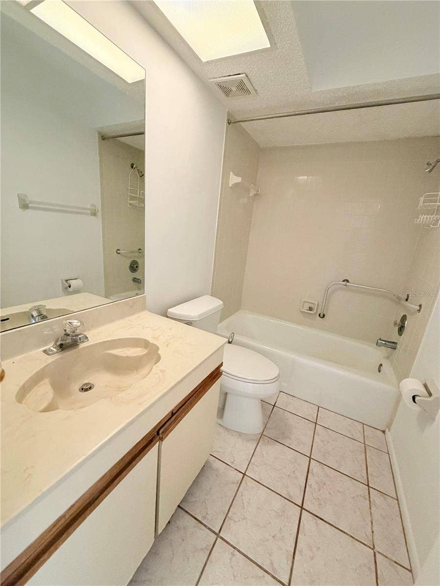 8151 HEATHERWOOD DRIVE, #111, Seminole, FL 33777 2nd bathroom w/ tub