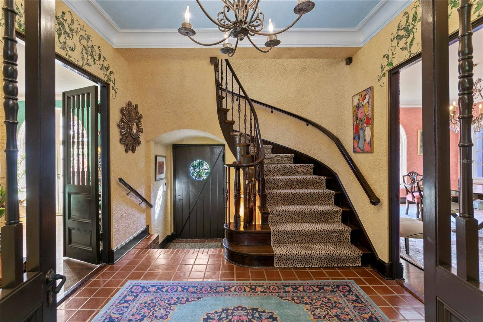 7211 3RD AVENUE S, St Petersburg, FL 33707 Foyer looking towards the front door flanked by the Living Room on the left and the Dining Room to the right. Nine foot ceilings in both levels.