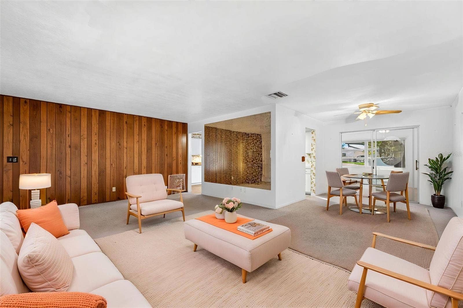 An open-concept living & dining combo offers a spacious and flexible layout for modern entertaining