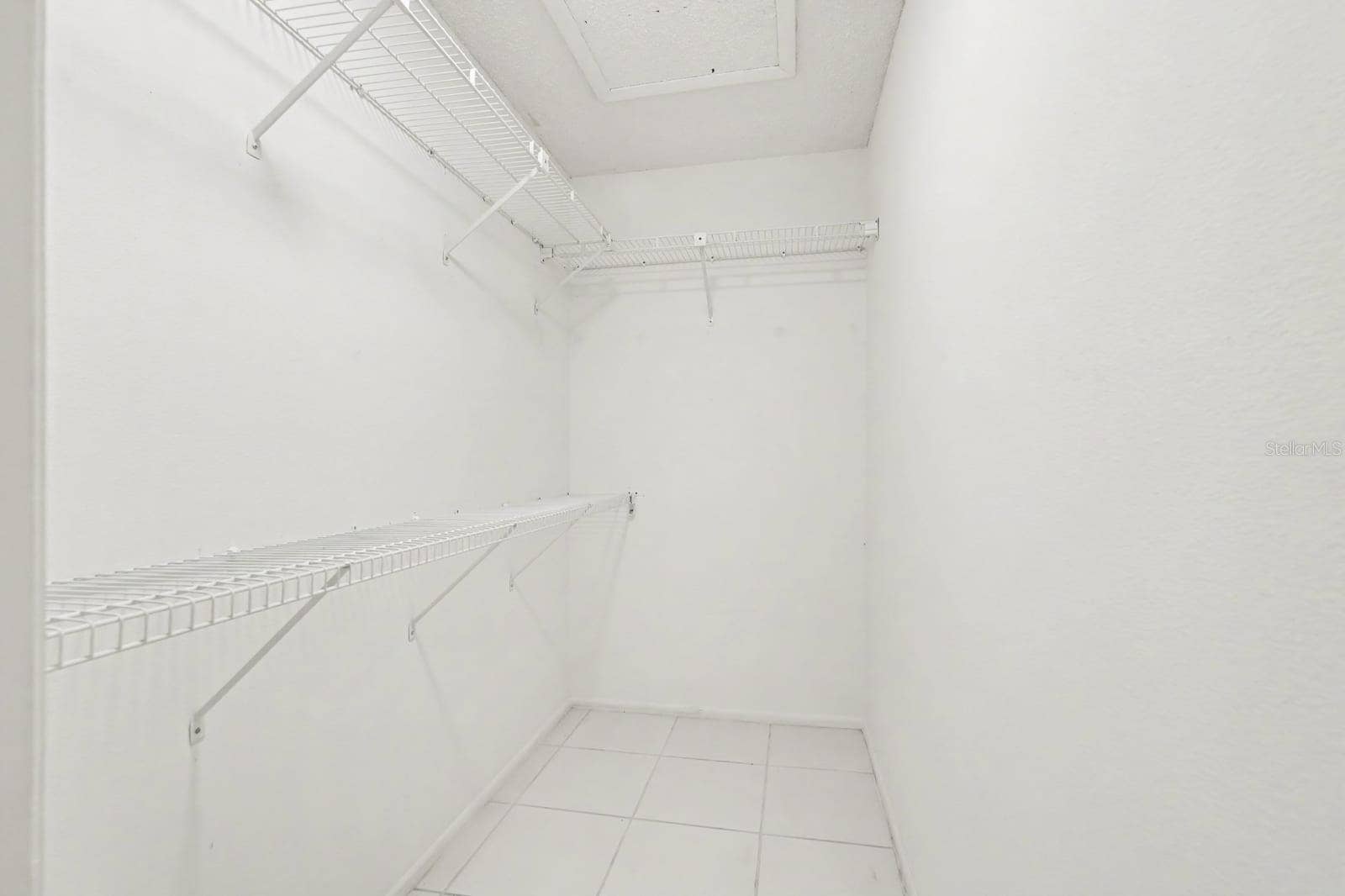 Dedicated Laundry Room with Wire Shelving for Storage Organization