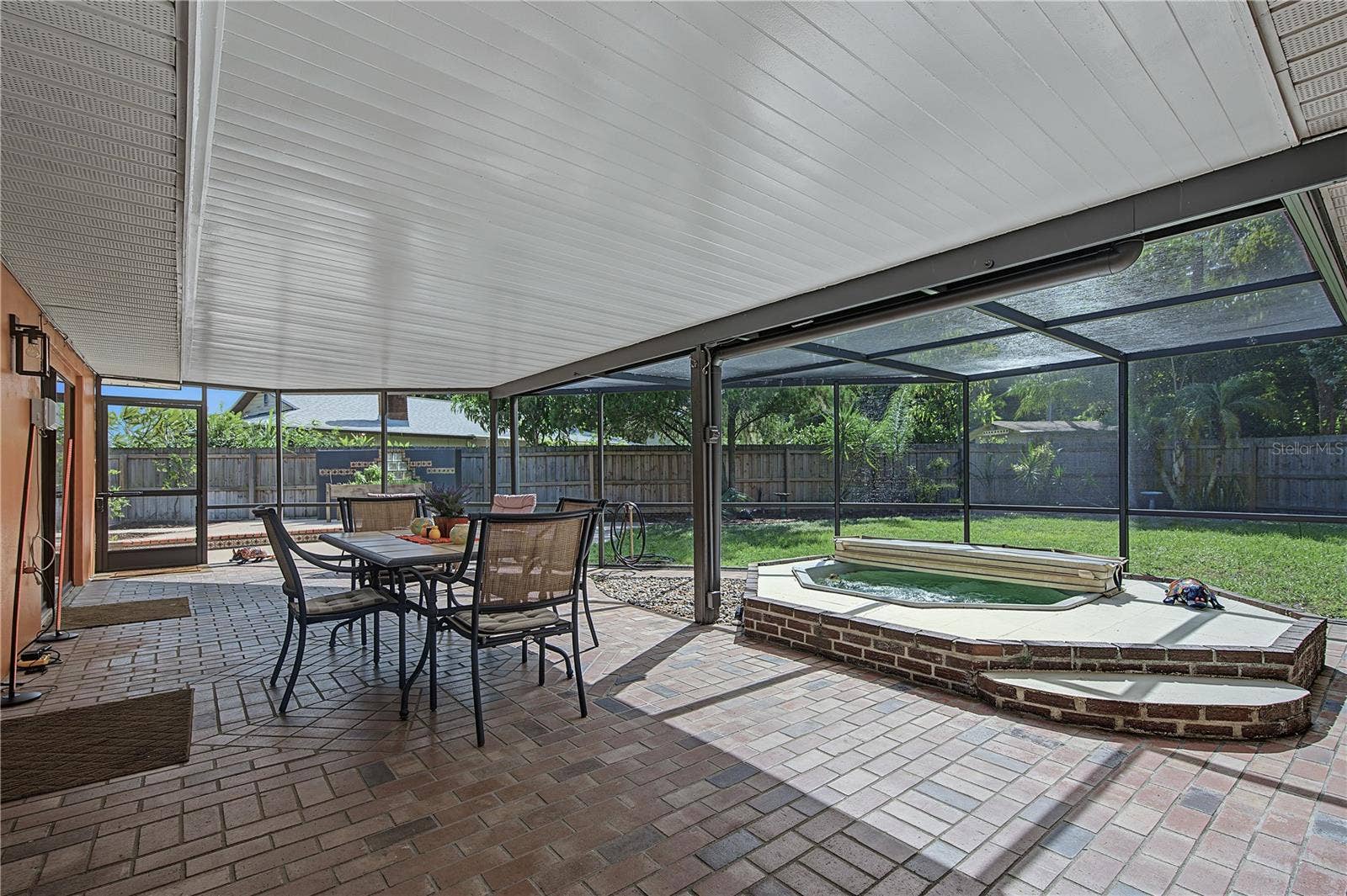 112 PEACOCK CIRCLE, Safety Harbor, FL 34695 32. HUGE Enclosed, Covered, Screened Lanai w Brick Paved Flooring.. Hot Tub.. GREAT VIEW of Your PRIVATE Backyard!