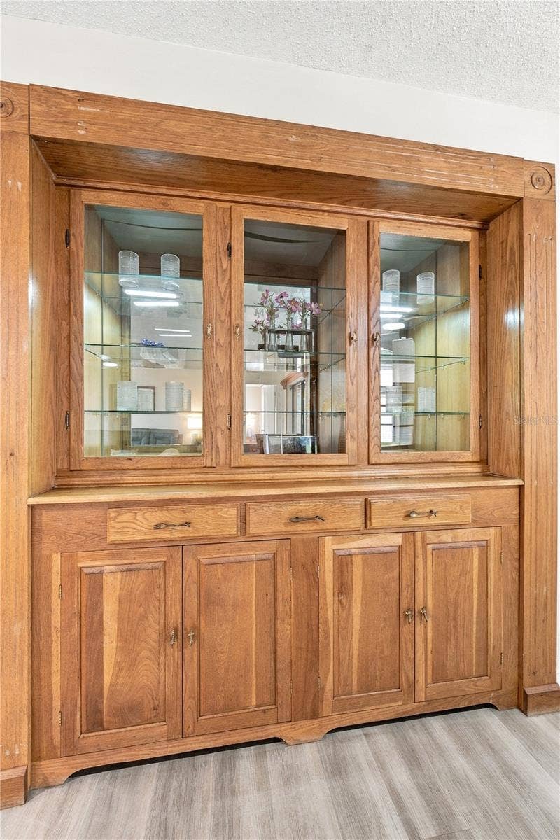 112 PEACOCK CIRCLE, Safety Harbor, FL 34695 47. Custom Built in Solid Wood Buffet is Timeless.. Drawers, Display Shelves, Cabinet Storage Underneath too!