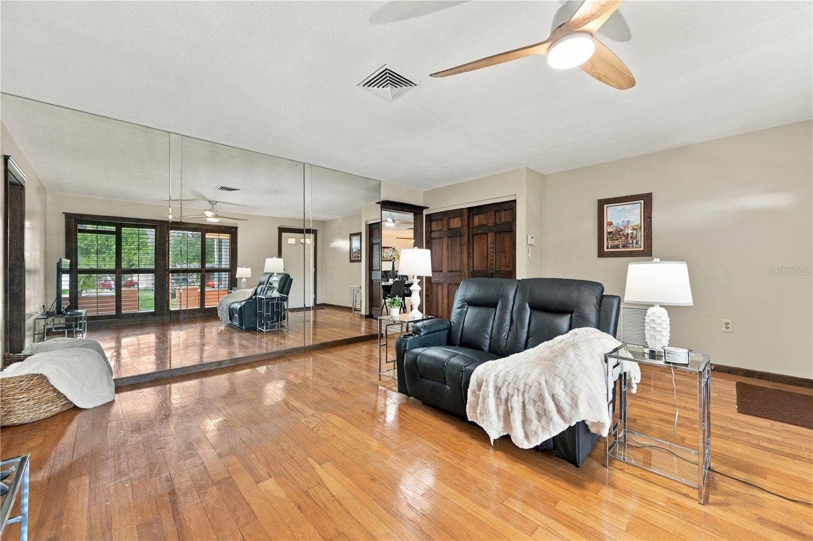 112 PEACOCK CIRCLE, Safety Harbor, FL 34695 12.Front Living Room is (12.7 x 15') .. Features Timeless Wood Flooring that Lasts!