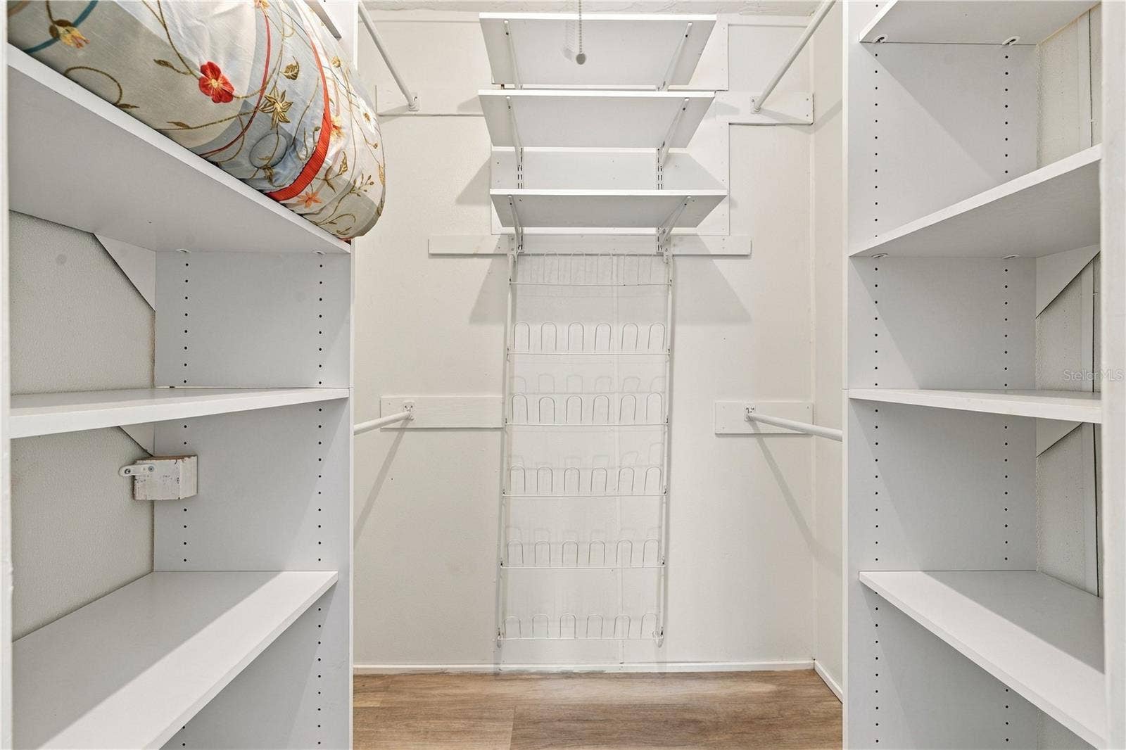112 PEACOCK CIRCLE, Safety Harbor, FL 34695 62. Walk in Closet (4.9 x 5.7') for Primary Bedroom .. Plenty of Storage!