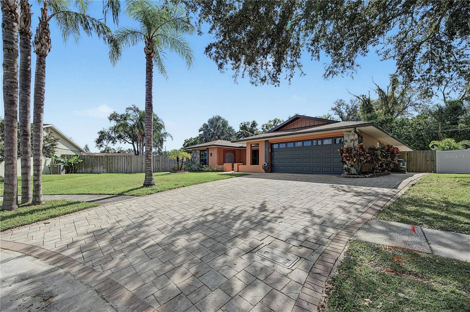 112 PEACOCK CIRCLE, Safety Harbor, FL 34695 2. Extra Wide Pavered Driveway - Easily Park 4 Cars!