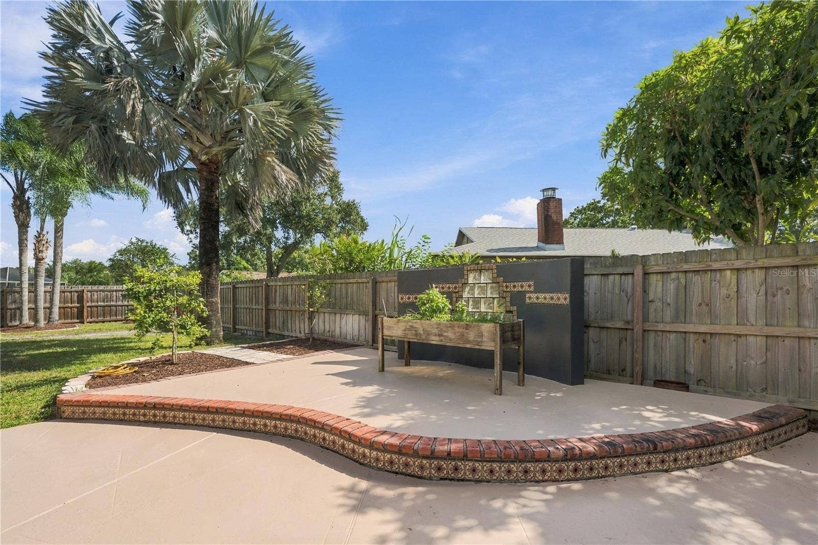 112 PEACOCK CIRCLE, Safety Harbor, FL 34695 71. 2-Tier Open Patio Freshly Painted w NON SLIP Paint..