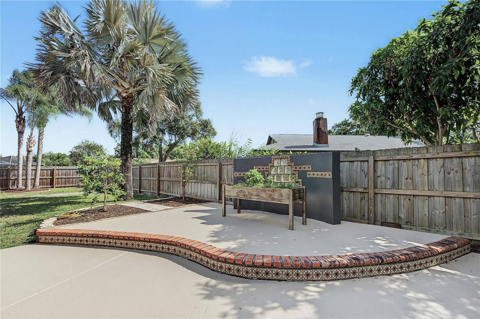 112 PEACOCK CIRCLE, Safety Harbor, FL 34695 36. This is a Unique & Very Hosting Friendly Feature! 2-Tier Open Patio to Use as You Wish!!