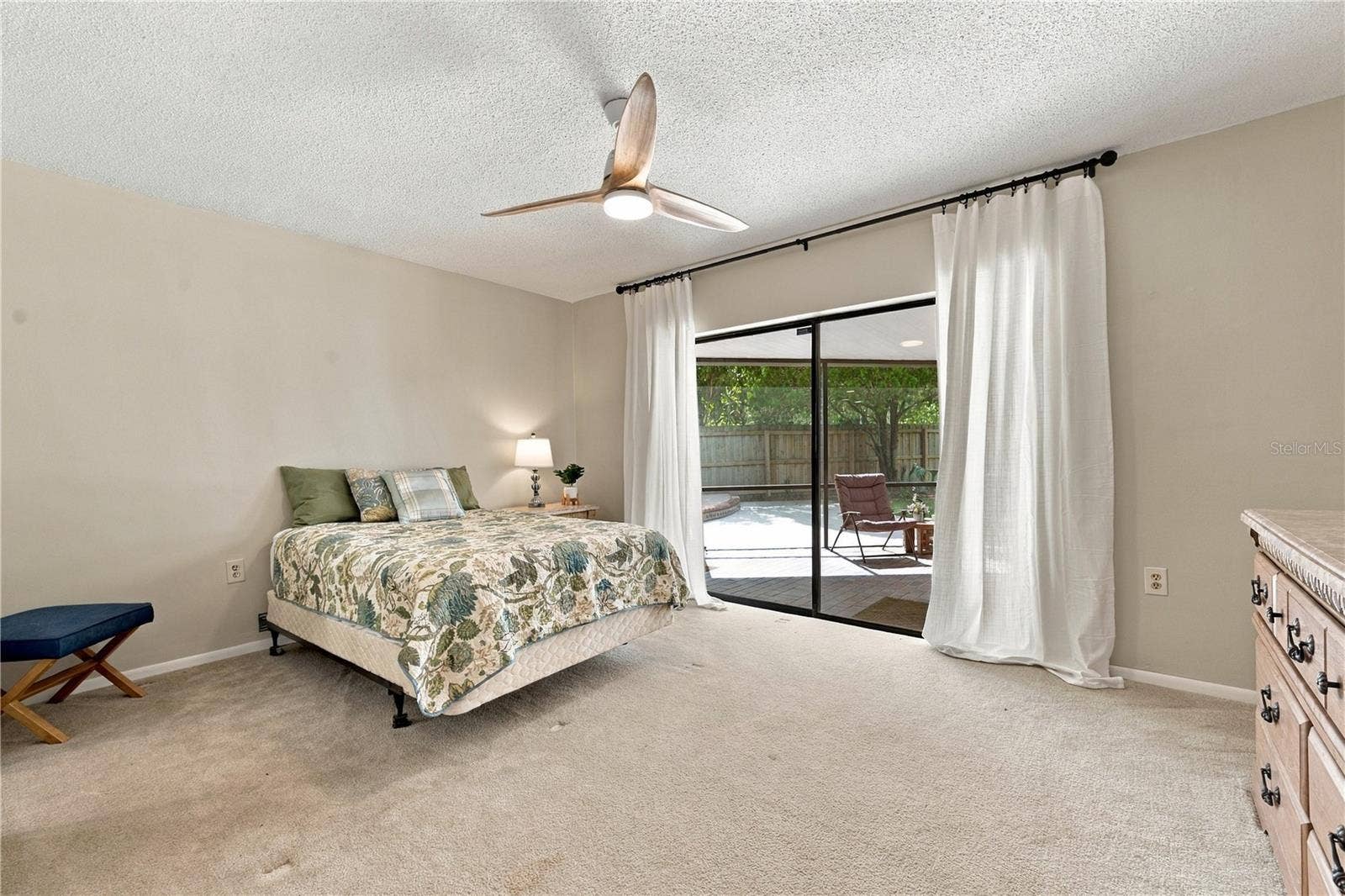 112 PEACOCK CIRCLE, Safety Harbor, FL 34695 64. Bedroom #2 (11.7 x 15') is About the Same Size as the Primary Bedroom.. a King Size Bed Fits Easily in this Room..