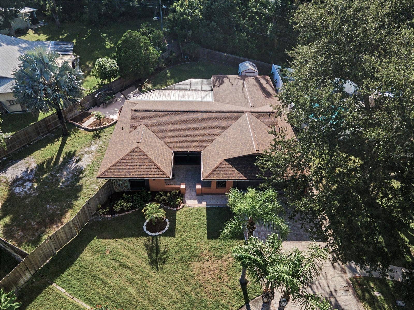 112 PEACOCK CIRCLE, Safety Harbor, FL 34695 40b. Shade Trees.. Pavers Galore.. Outdoor Living.. 1/4 Acre Lot.. New Roof.. HVAC 2024 .. & So MUCH MORE!