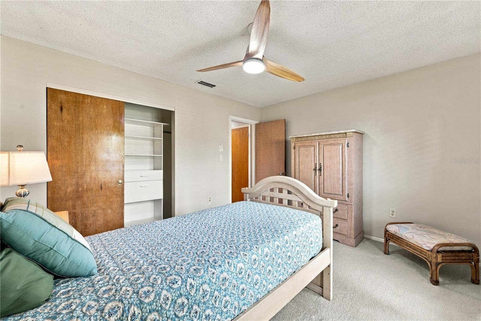 112 PEACOCK CIRCLE, Safety Harbor, FL 34695 27. Bedrm #3 (11 x 12.9') Offers a Built Out Closet for Maximum Storage!