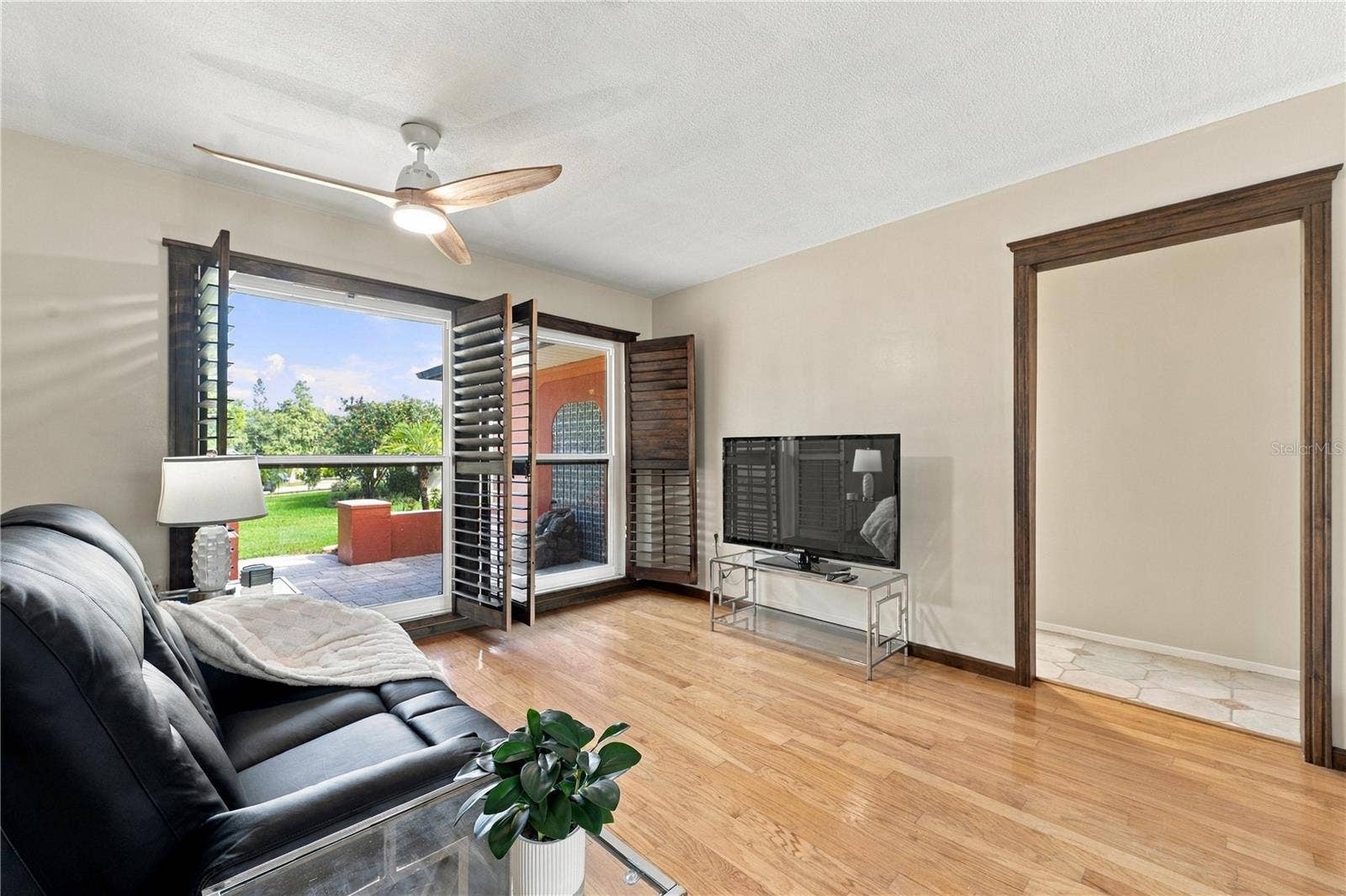 112 PEACOCK CIRCLE, Safety Harbor, FL 34695 45. Front Living Room (12.7 x 15') Showing Shutters OPEN.. (All the Way - Not Just the Slats).